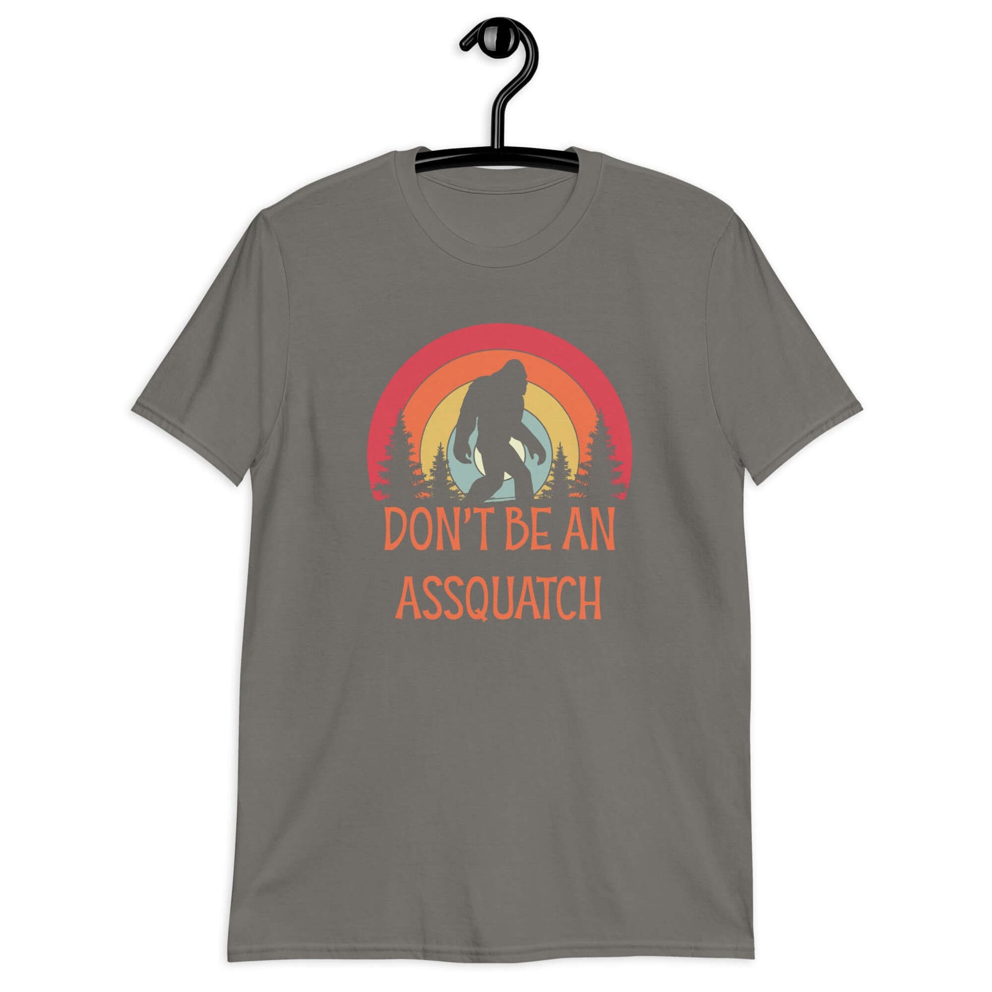 Charcoal grey t-shirt with sasquatch graphic with sasquatch graphic and the words don't be an assquatch printed on the front.