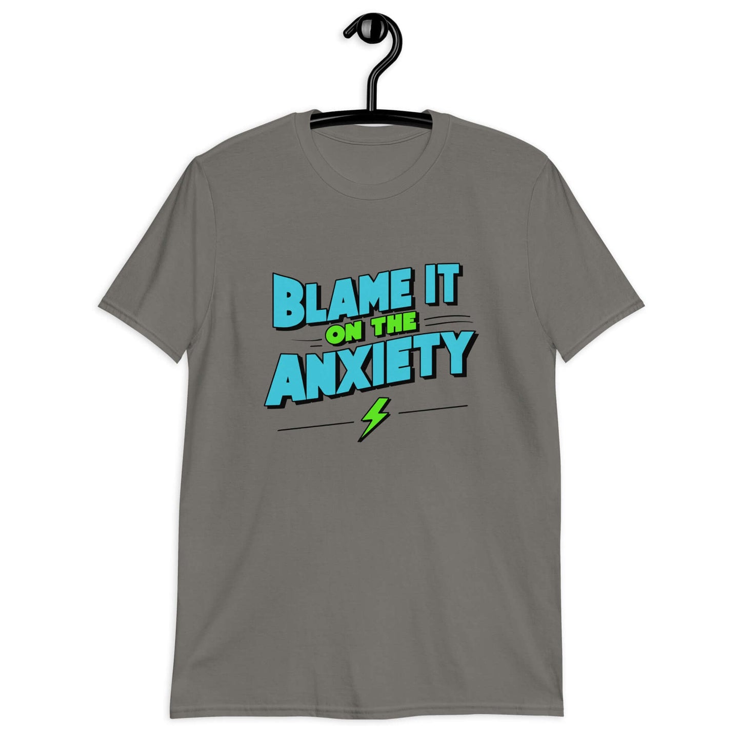 Charcoal grey t-shirt with the phrase Blame is on the anxiety printed on the front. The graphics are bold and in aqua and lime green.