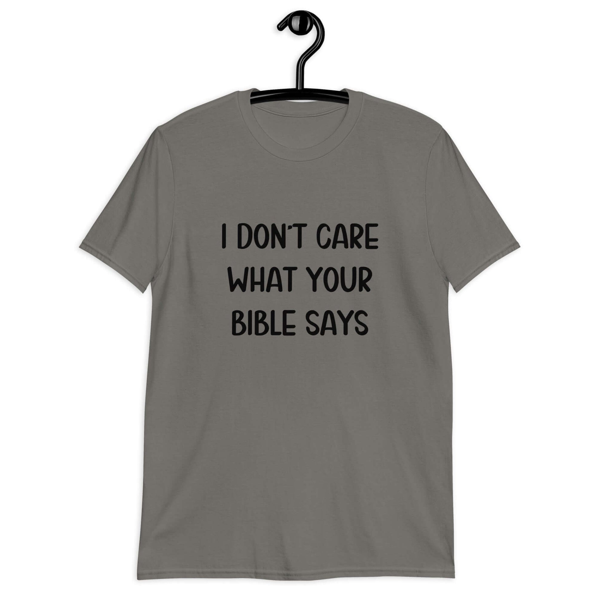 Charcoal grey t-shirt with the phrase I don't care what your bible says printed on the front.