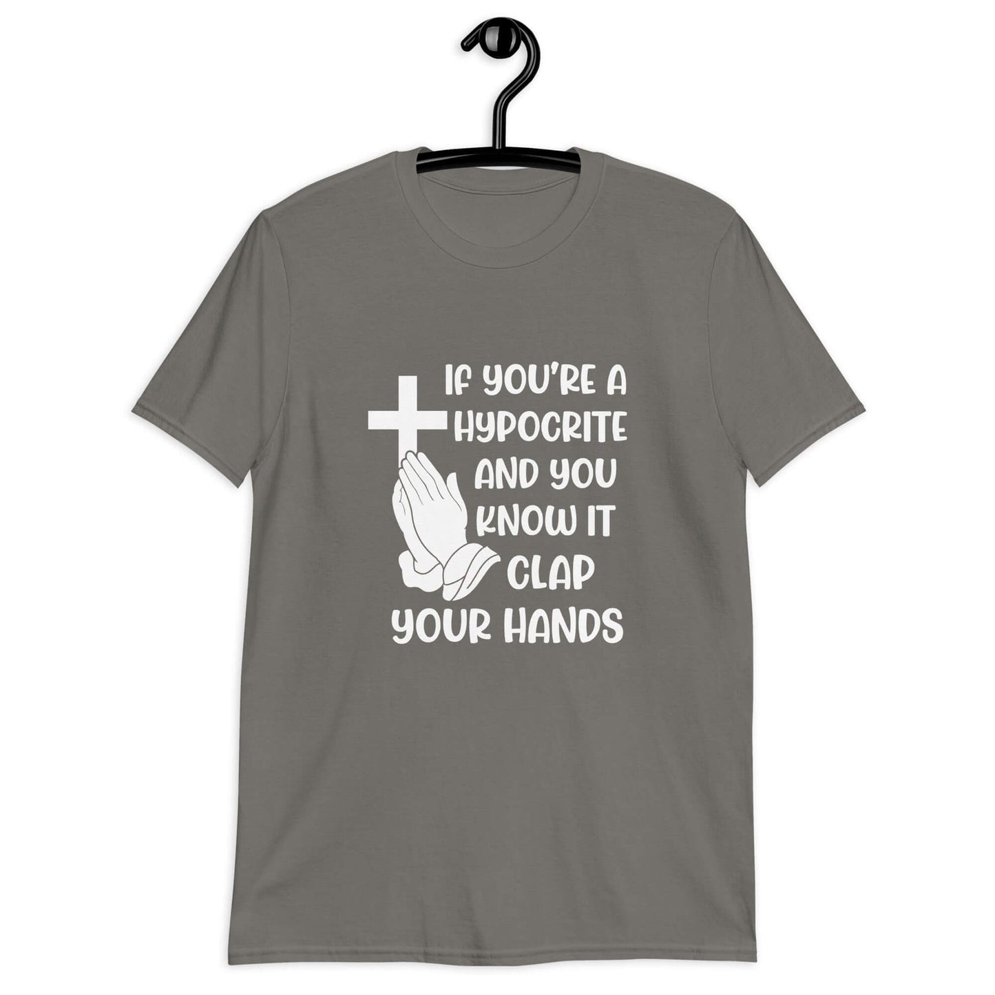 Charcoal grey t-shirt with image of a cross and praying hands & the phrase If you're a hypocrite and you know it clap your hands printed on the front.