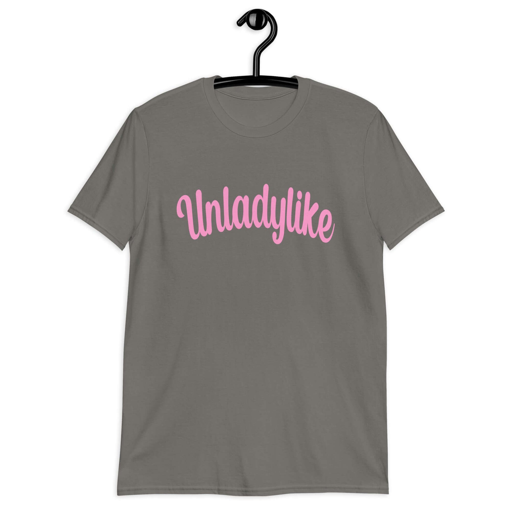 Charcoal t-shirt with the word Unladylike printed on the front in pink.