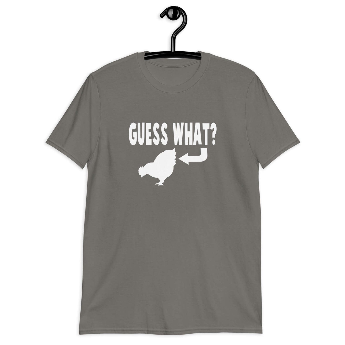 Charcoal t-shirt with an image of a chicken and the words Guess what question mark. There is an arrow pointing to the chickens butt. The graphics are printed on the front of the shirt.