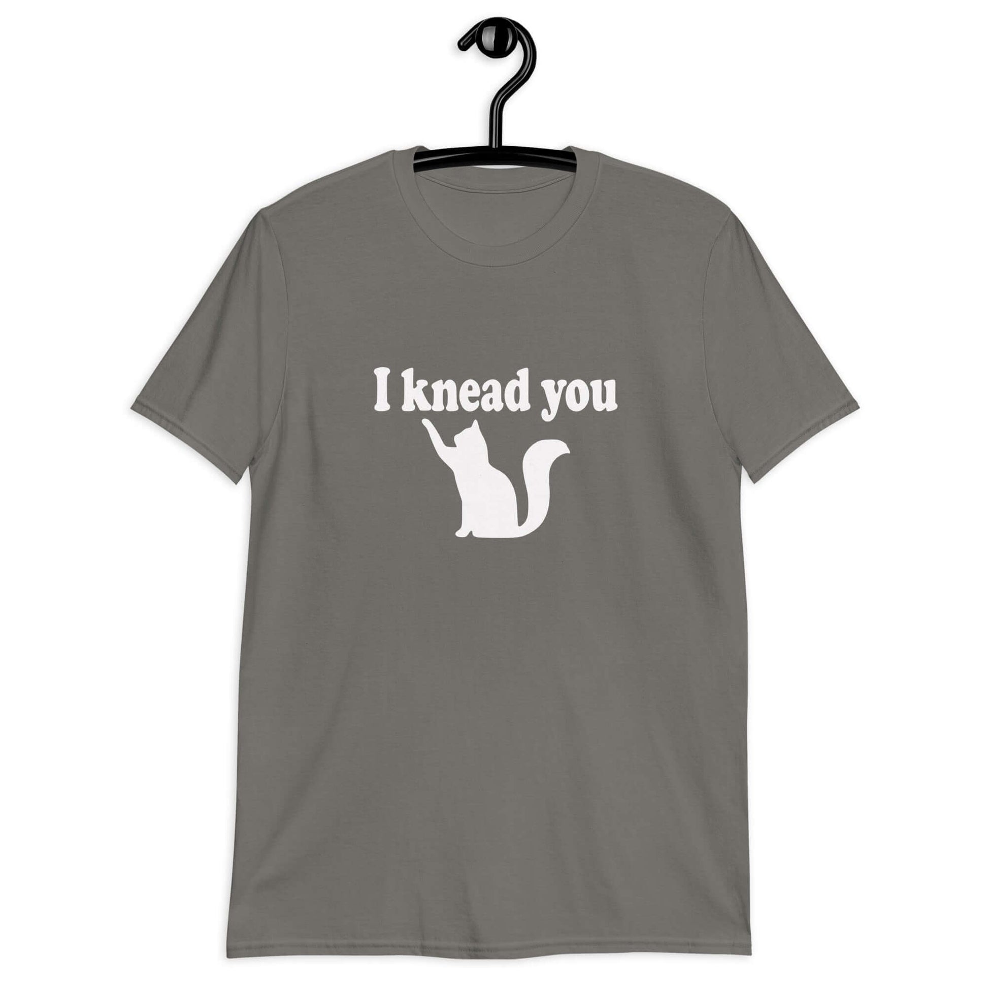 Charcoal t-shirt that has an image of a silhouette of a cat and the words I knead you printed on the front.