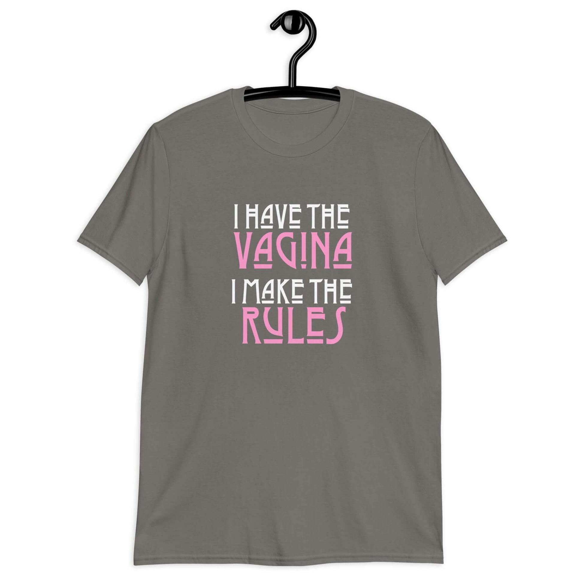 Charcoal grey t-shirt with the words I have the vagina , I make the rules printed on the front. The words vagina and rules are pink, the rest of the words are white.