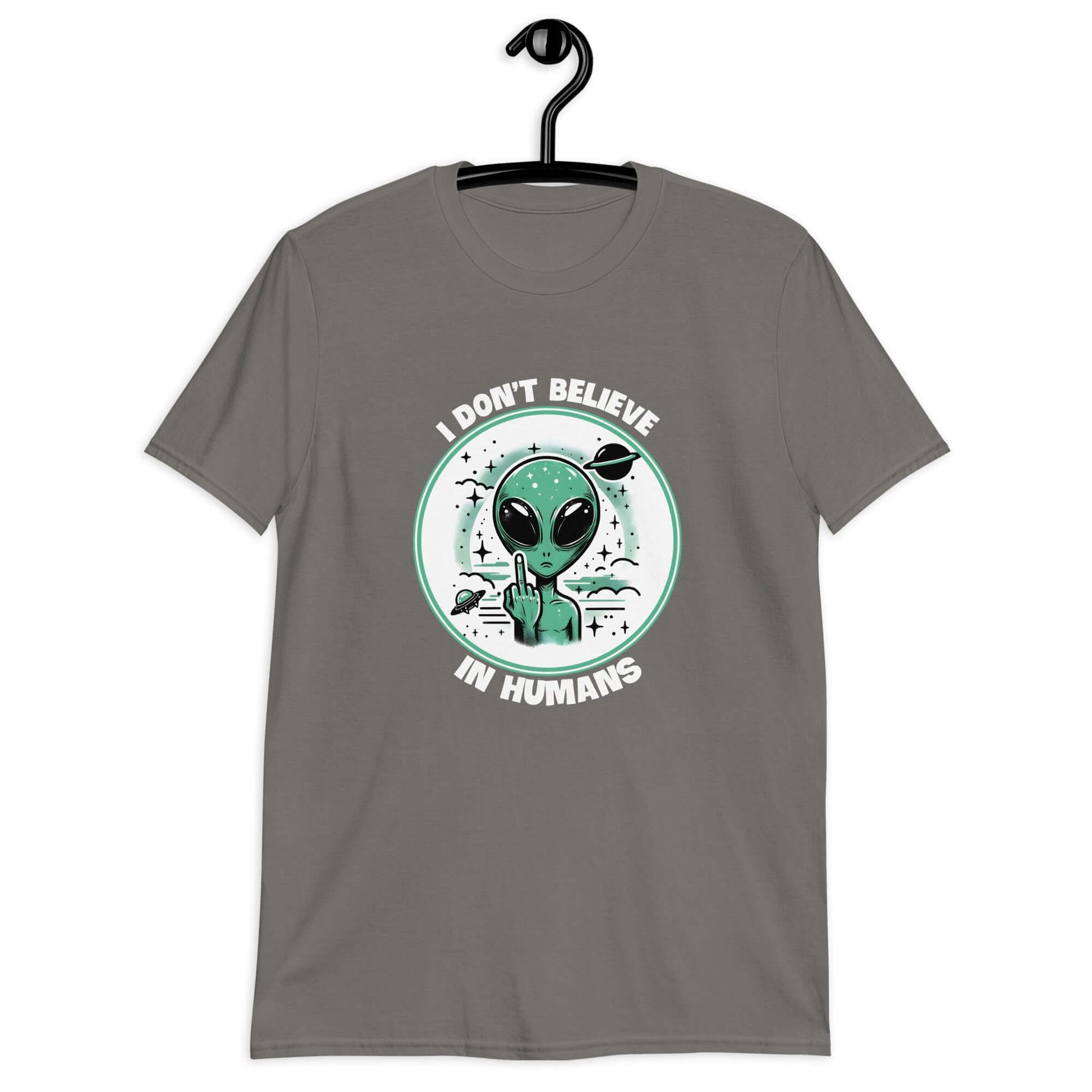 Charcoal grey t-shirt with an image of an alien flipping the middle finger. The words I don't believe in humans are printed around the image. The graphics are printed on the front of the shirt.