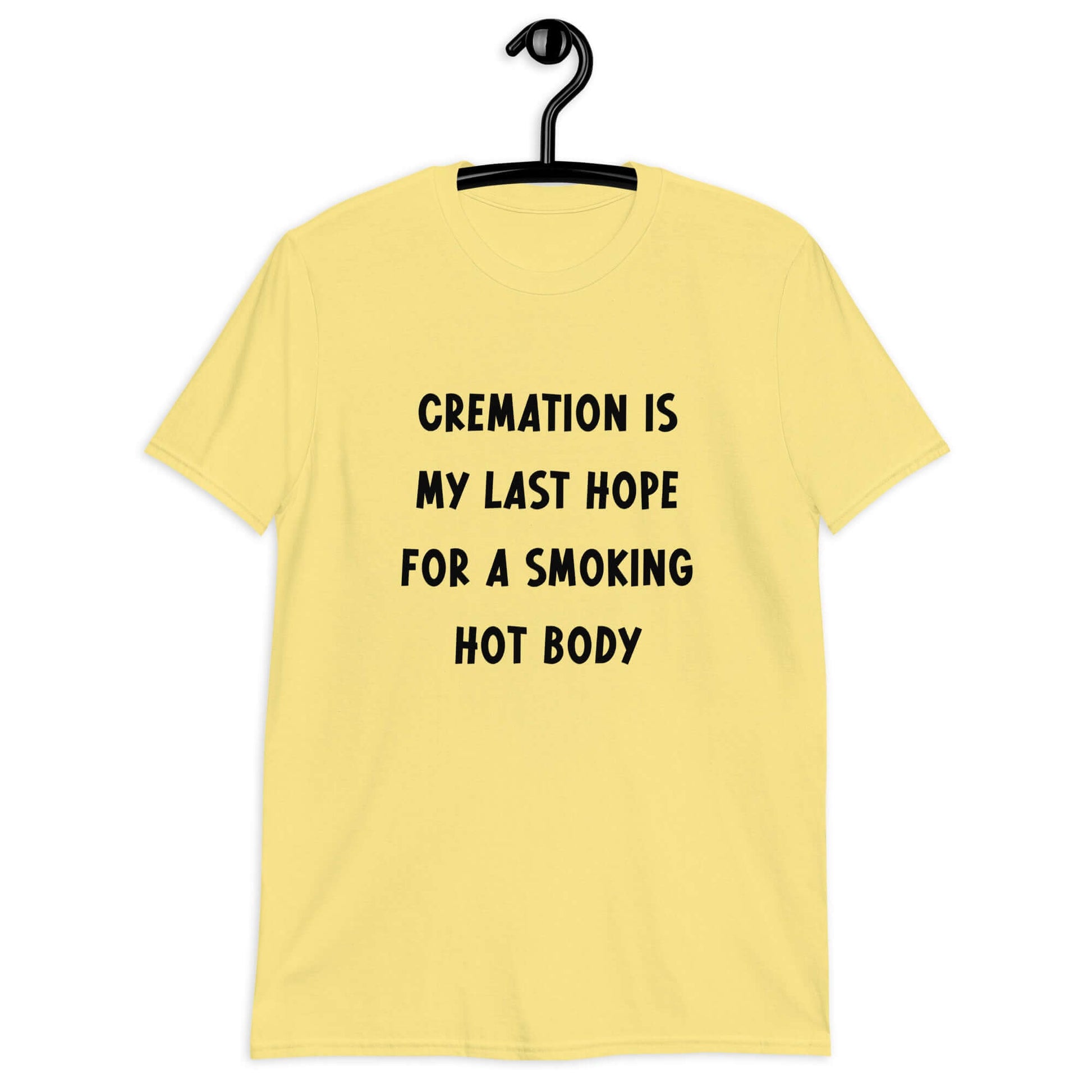 Cornsilk yellow t-shirt with the words Cremation is my last hope for a smoking hot body printed on the front.