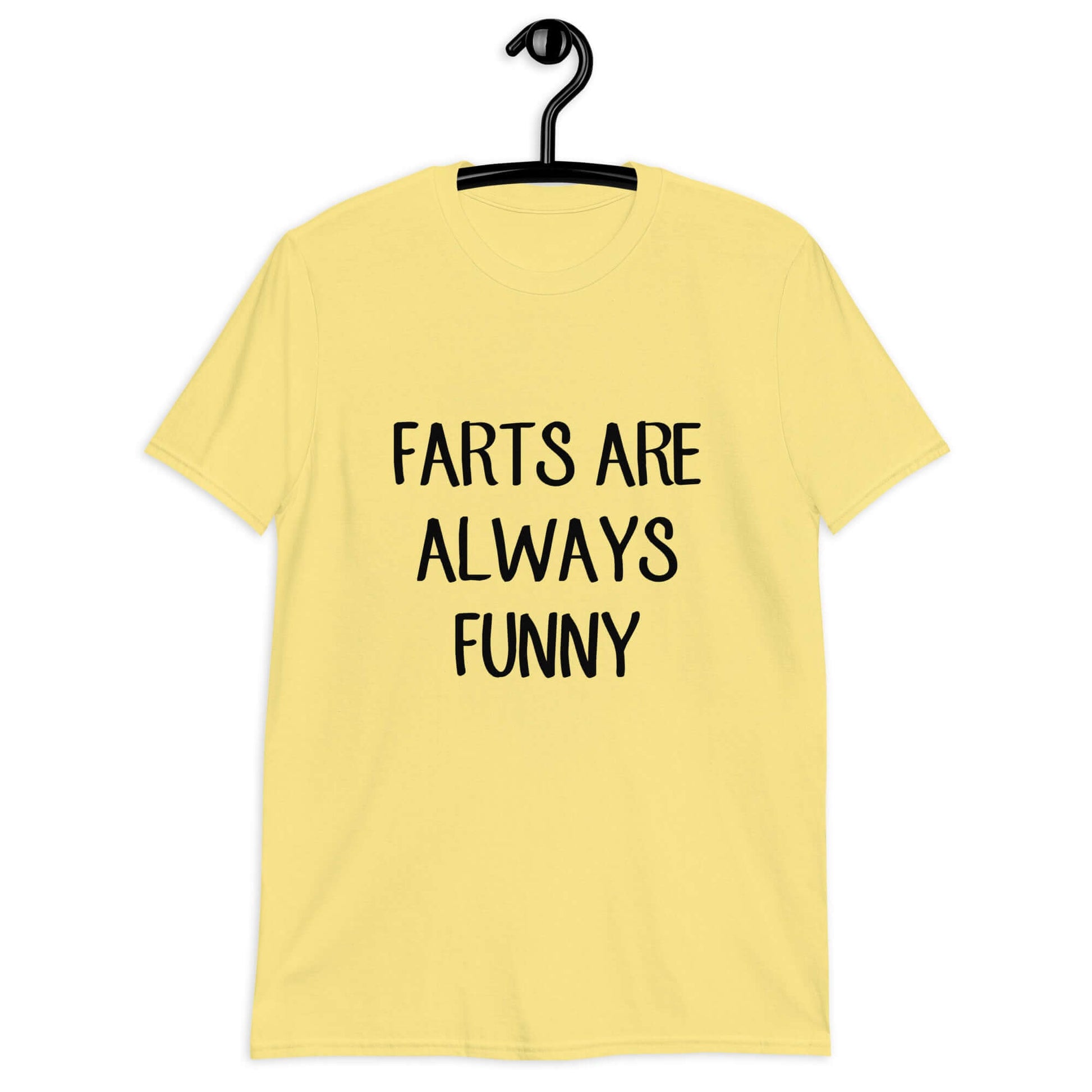 Cornsilk yellow t-shirt with the phrase Farts are always funny printed on the front.