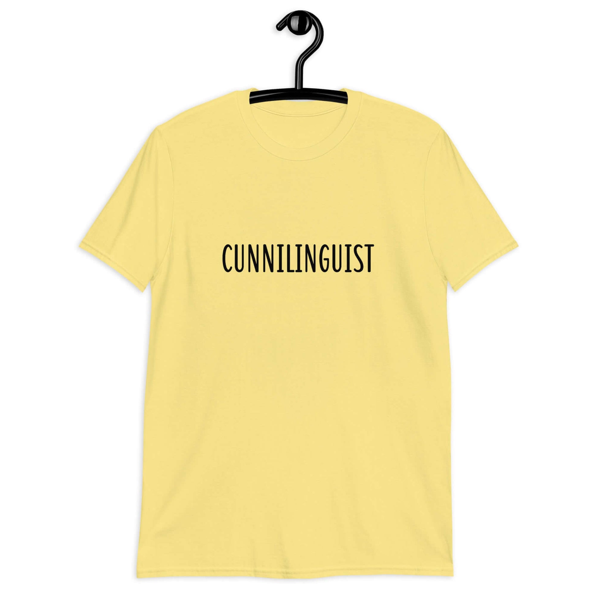Cornsilk yellow t-shirt with the word Cunnilinguist printed on the front.