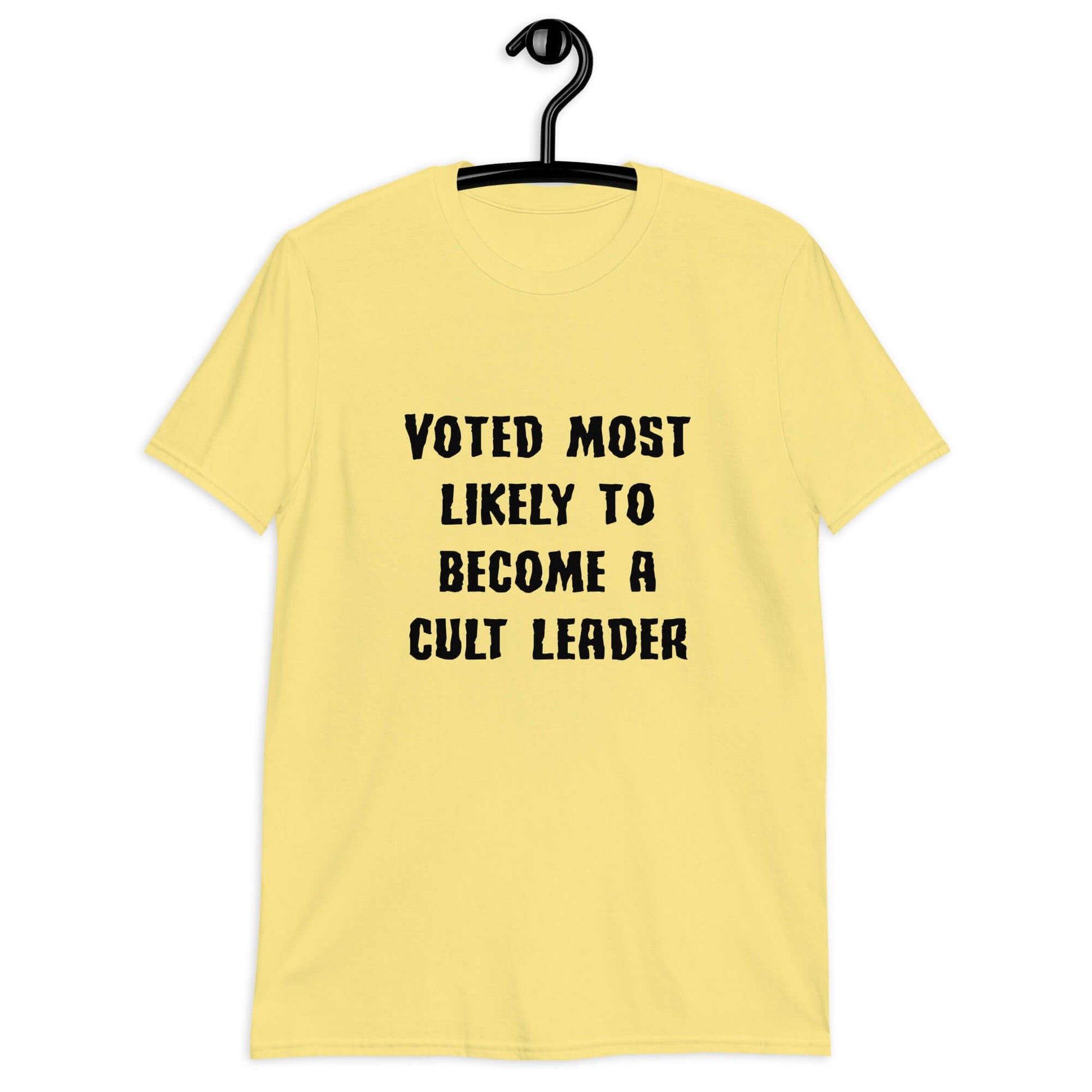 Cornsilk yellow t-shirt with the phrase Voted most likely to become a cult leader printed on the front.