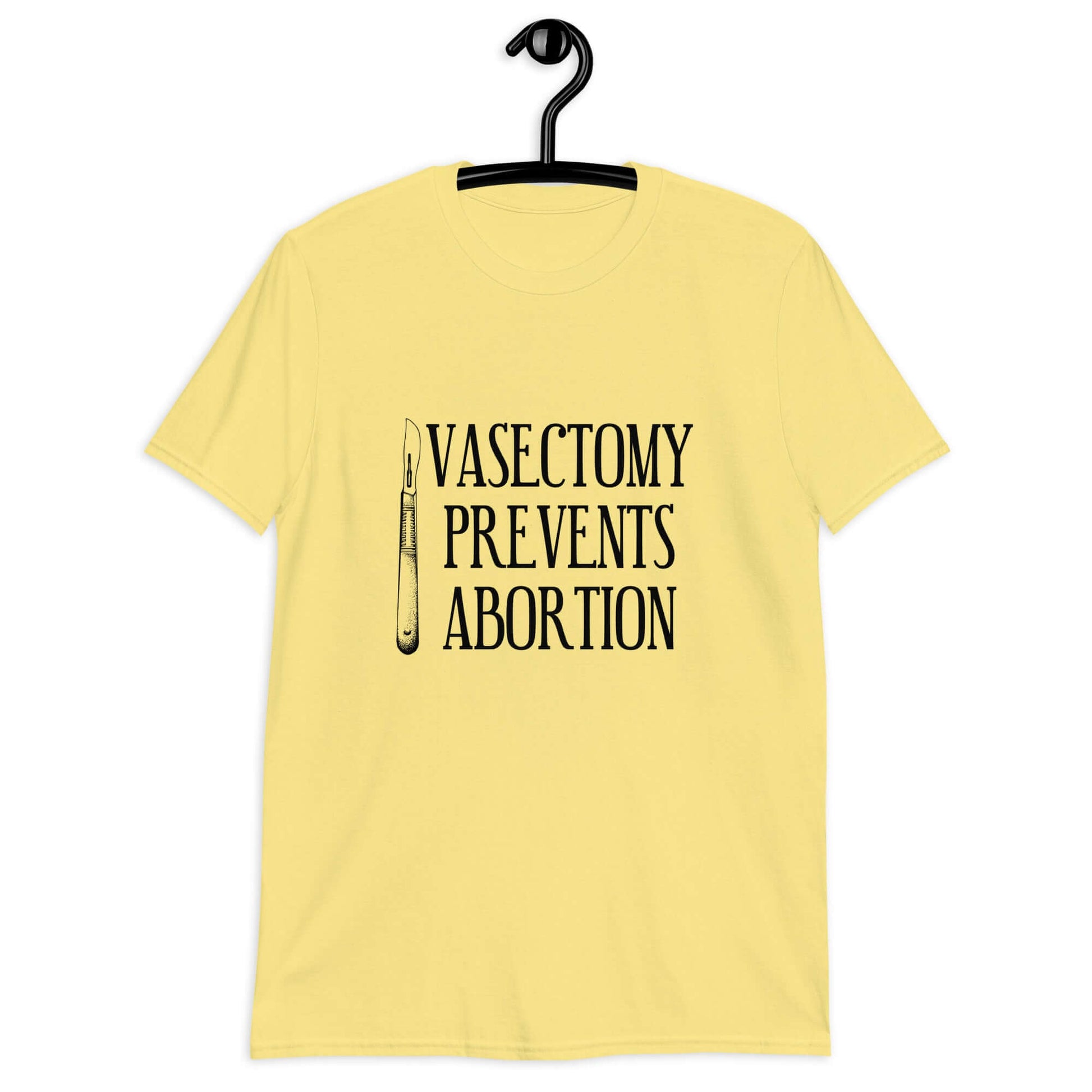 Cornsilk yellow t-shirt that has an image of a surgical scalpel and the phrase Vasectomy prevents abortion printed on the front.