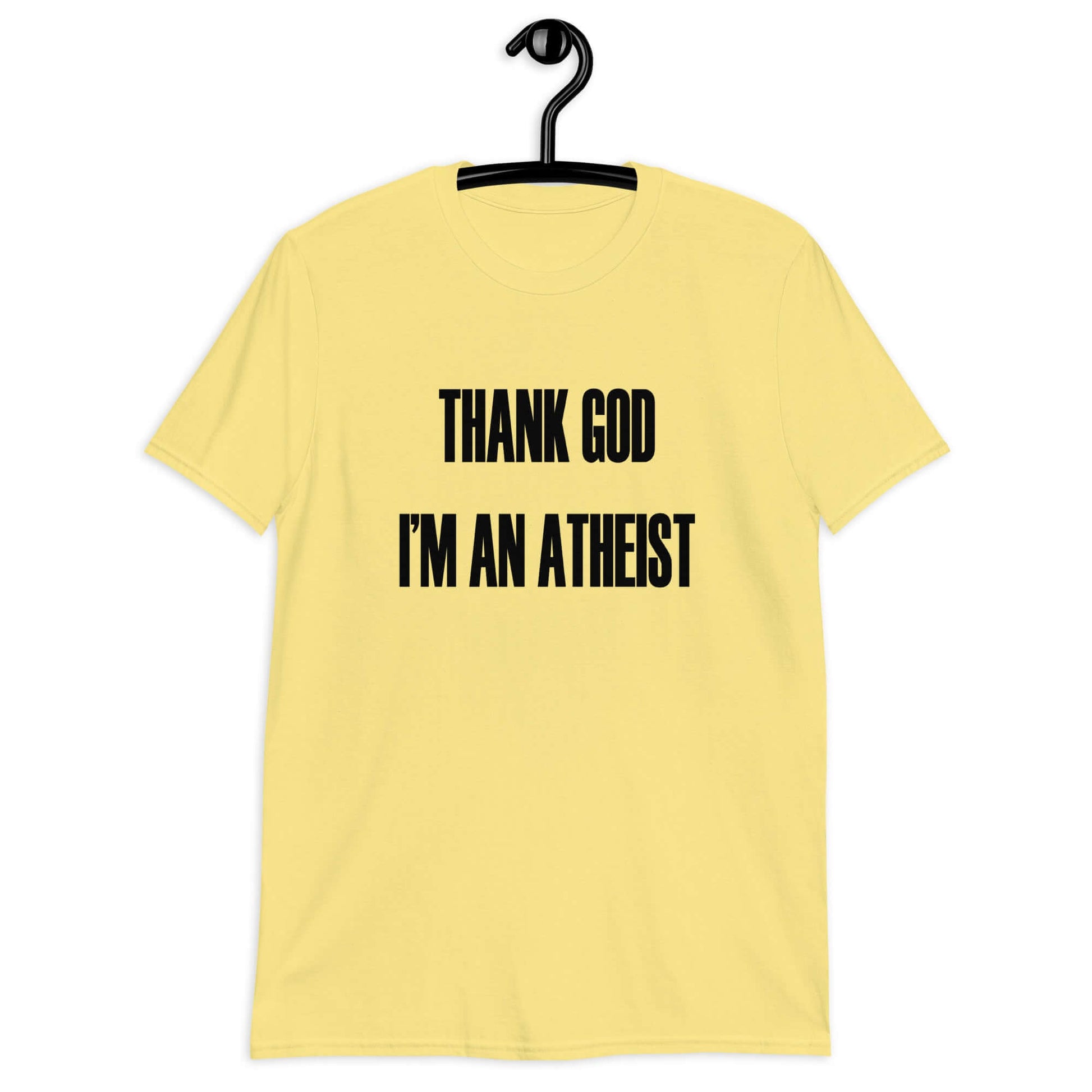 Cornsilk yellow t-shirt with the phrase Thank God I'm an atheist printed on the front.
