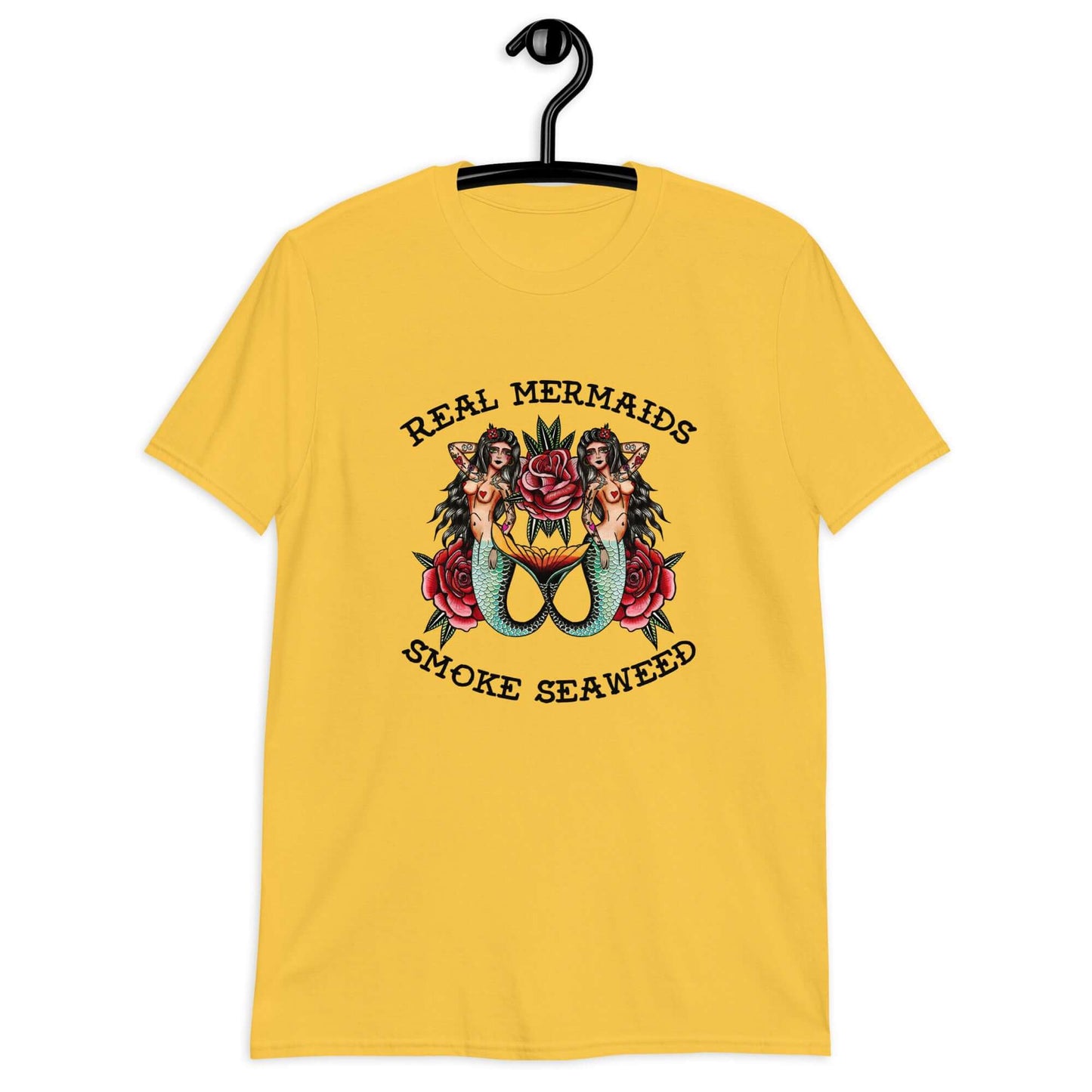Daisy yellow t-shirt with image of 2 mermaids and the words Real mermaids smoke seaweed printed on the front.