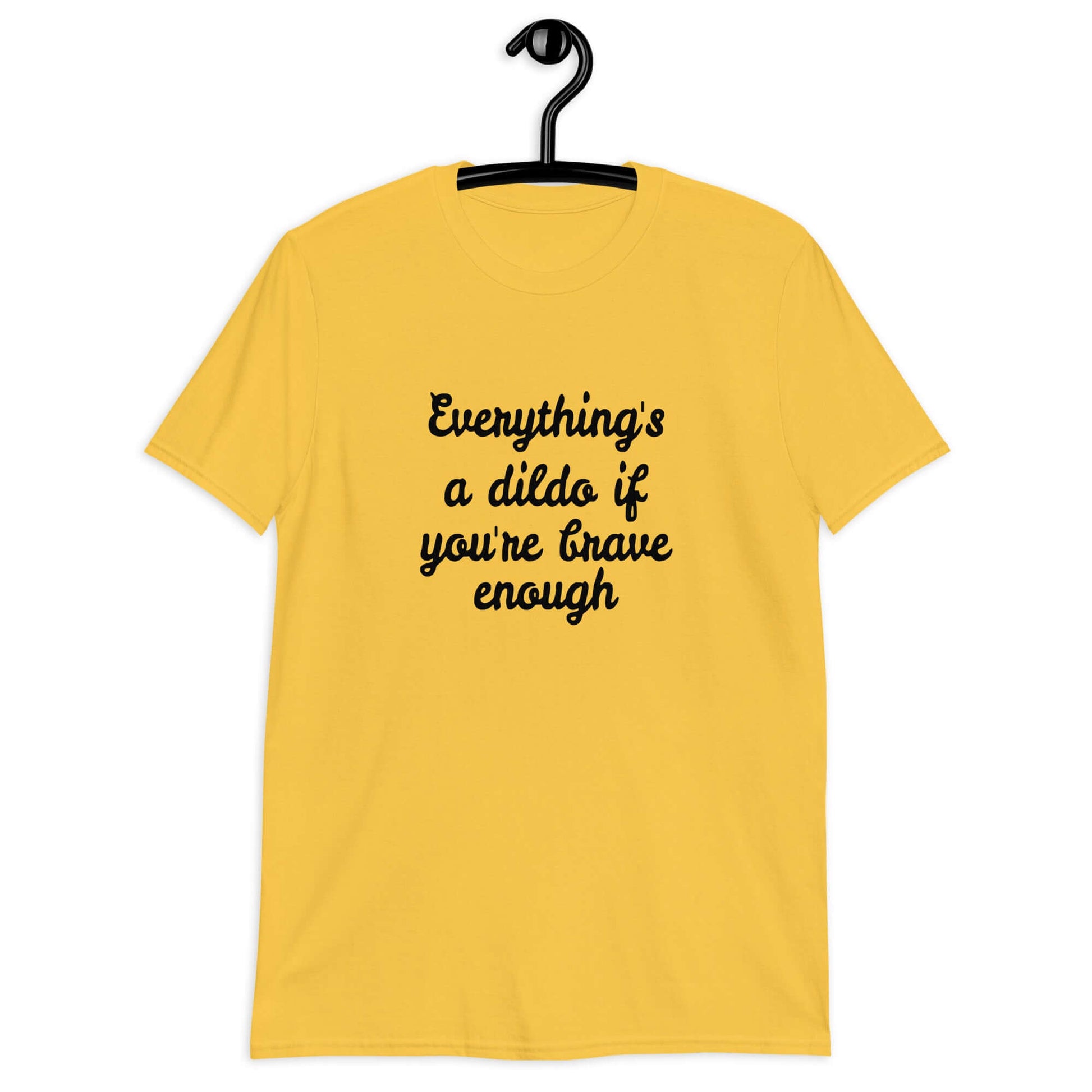 Daisy yellow t-shirt with the phrase Everything's a dildo if you're brave enough printed on the front.