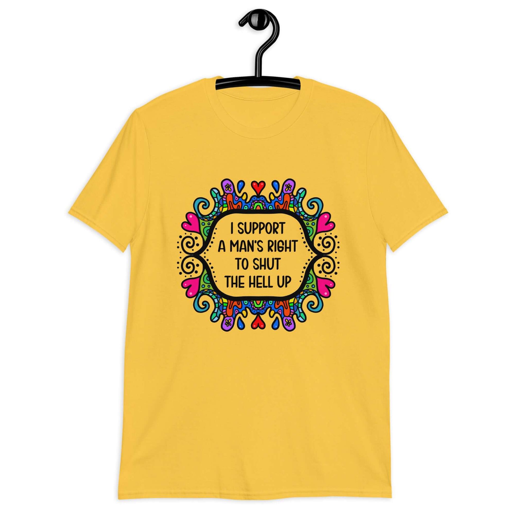 Daisy yellow t-shirt with a colorful doodle graphic and the words I support a man's right to shut the hell up printed on the front.