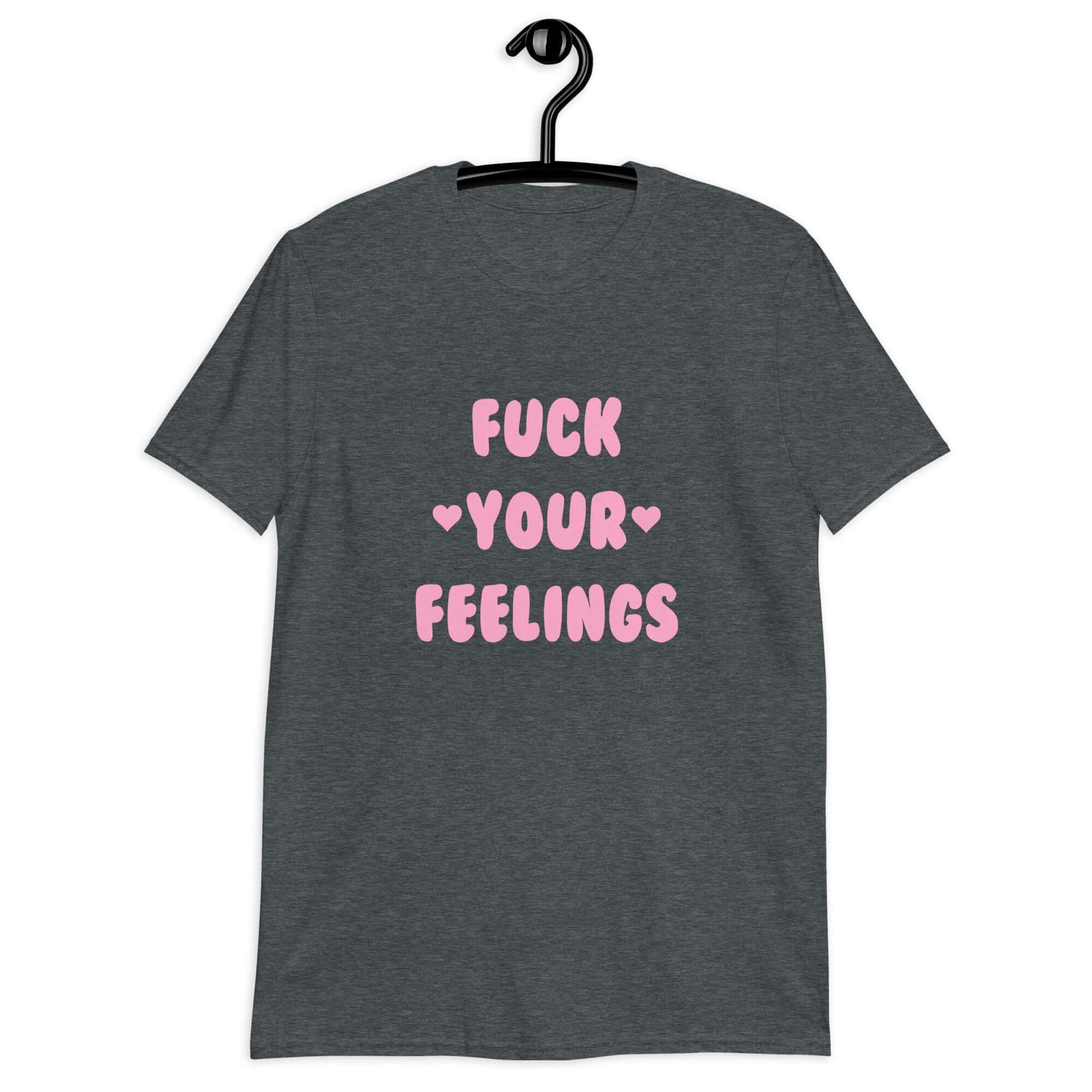 Dark heather t-shirt with the words Fuck your feelings printed on the front in pink. There are cute pink hearts next to the words.