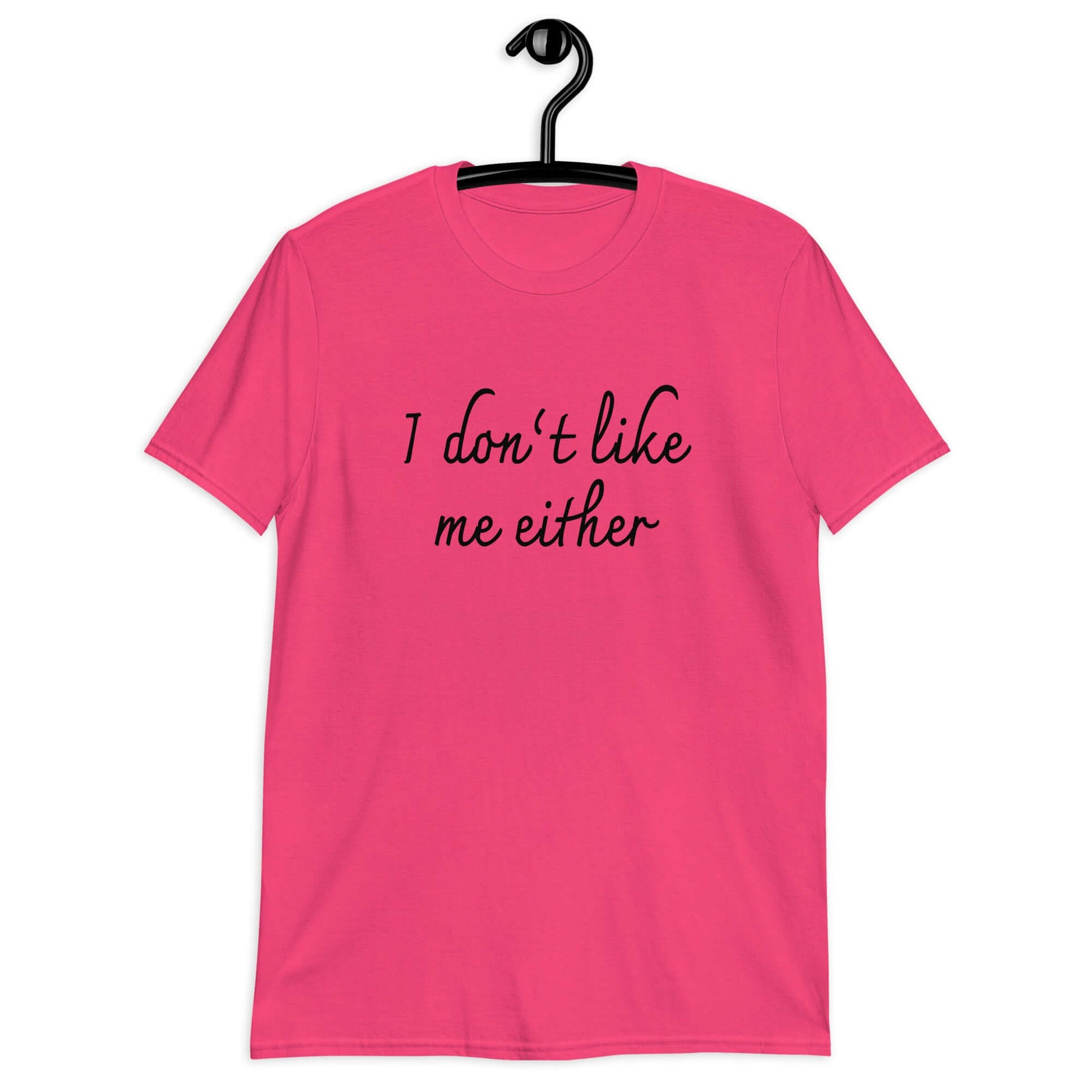 Heliconia pink t-shirt with the phrase I don't like me either printed on the front.