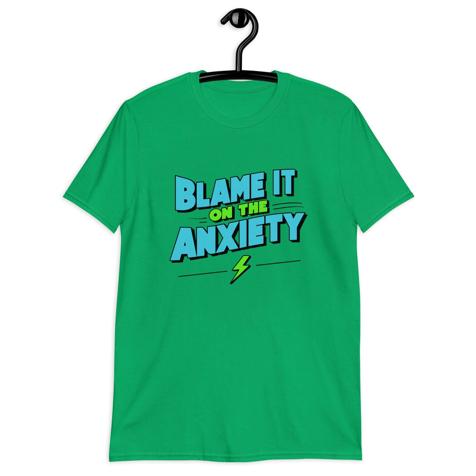 Irish green t-shirt with the phrase Blame is on the anxiety printed on the front. The graphics are bold and in aqua and lime green.