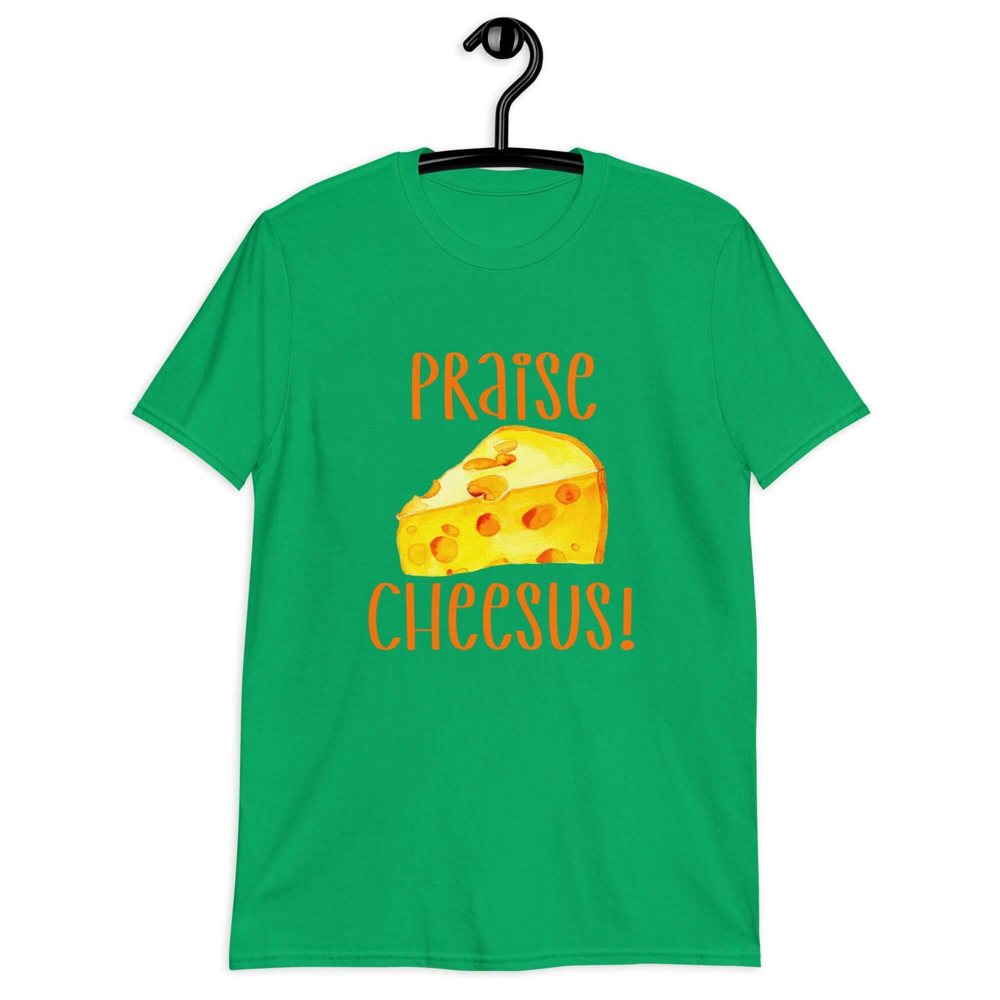 Irish green t-shirt with funny graphics of a piece of swiss cheese and the words Praise Cheesus printed on the front of the hoodie in yellow and orange.