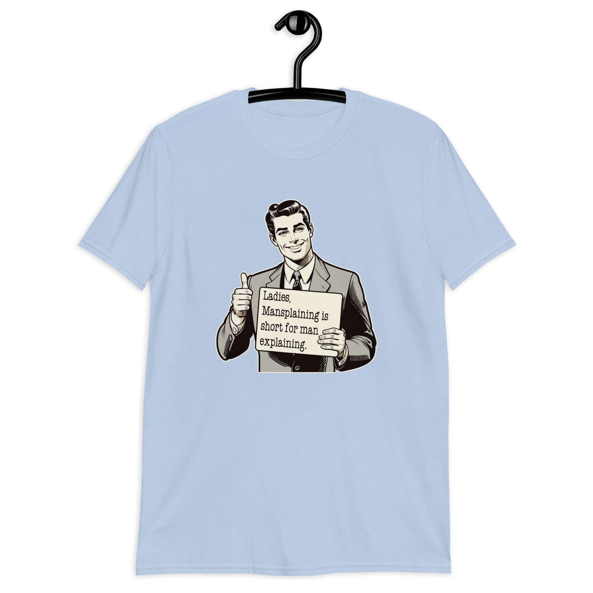 Light blue t-shirt with a graphic of a retro man holding a sign. The sign says Ladies, mansplaining is short for man explaining. The graphics are printed on the front of the shirt.