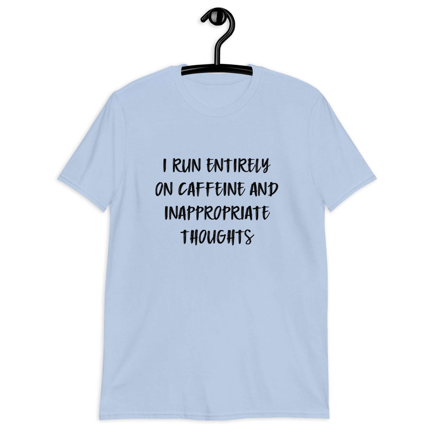 Light blue t-shirt with the phrase I run entirely on caffeine & inappropriate thoughts printed on the front.