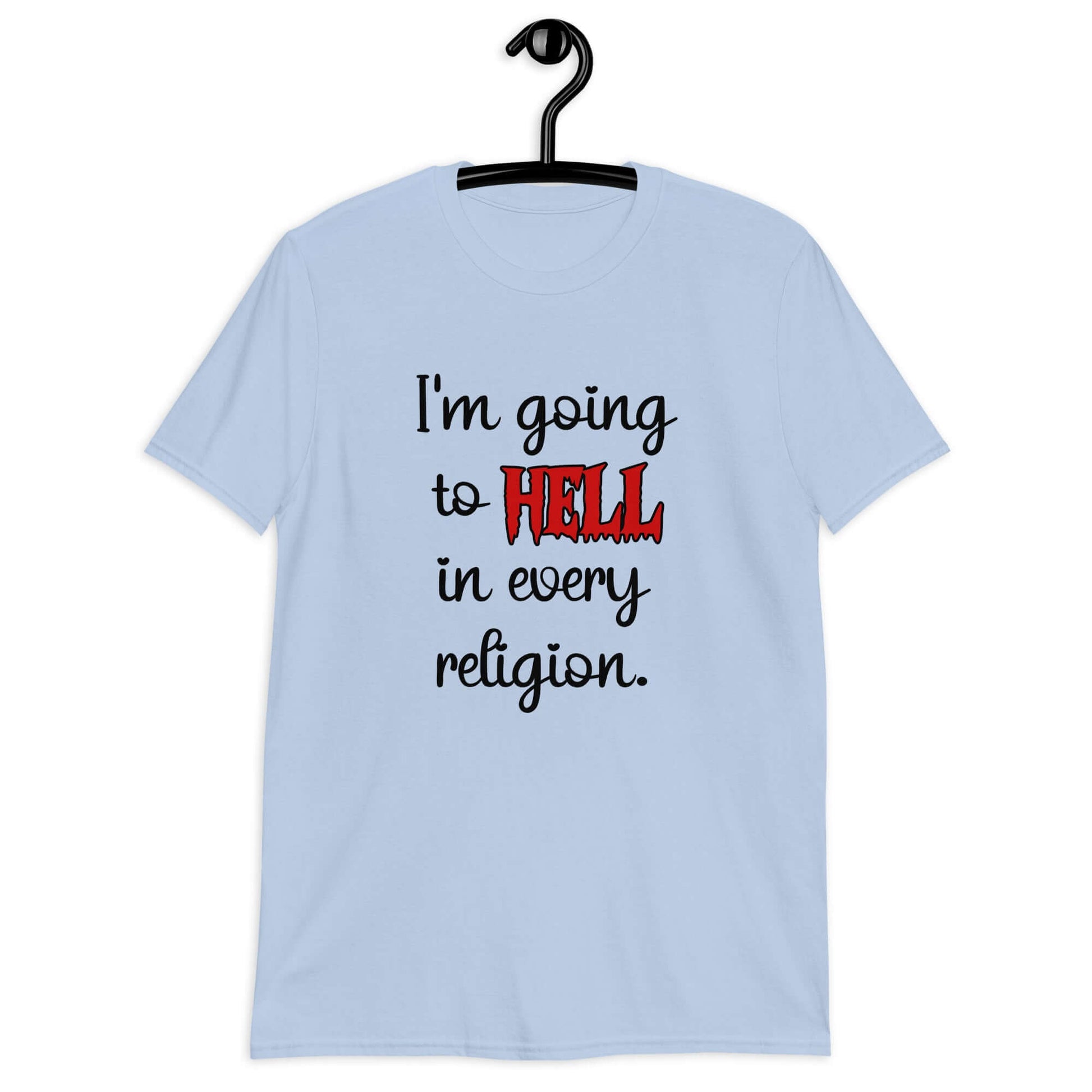 Light blue t-shirt with the phrase I'm going to hell in every religion printed on the front. The word hell is printed in red. The rest of the text is black.