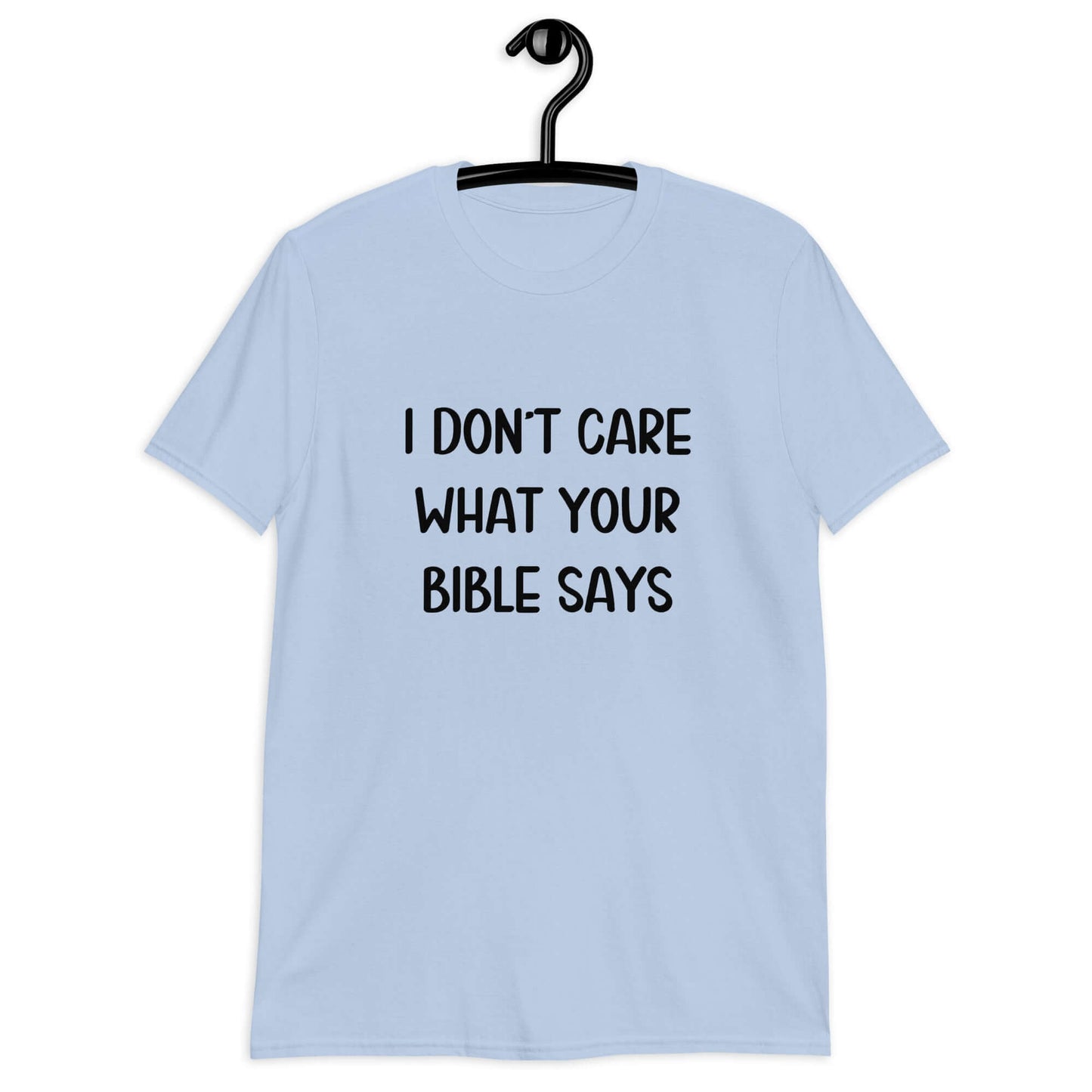 Light blue t-shirt with the phrase I don't care what your bible says printed on the front.