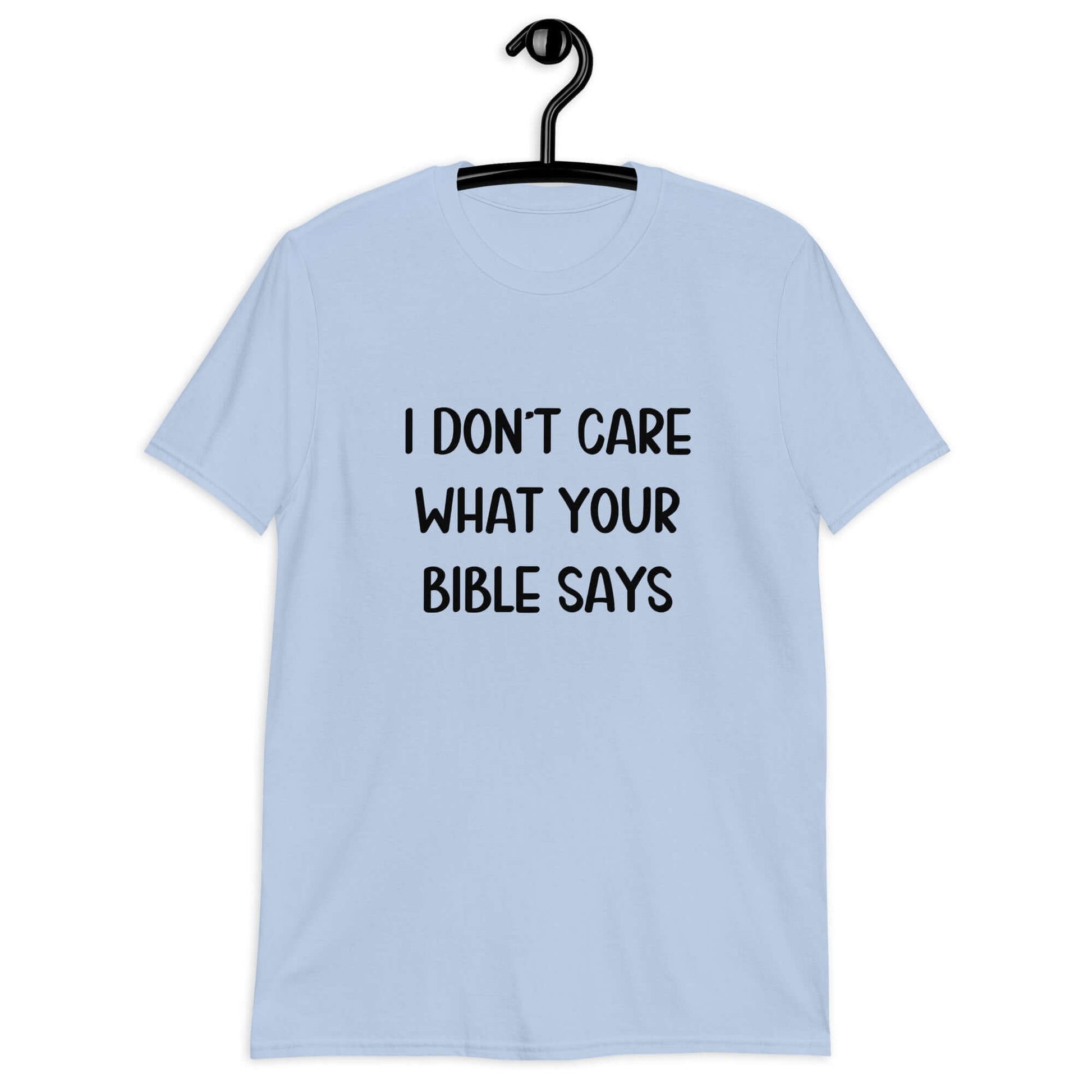 Light blue t-shirt with the phrase I don't care what your bible says printed on the front.