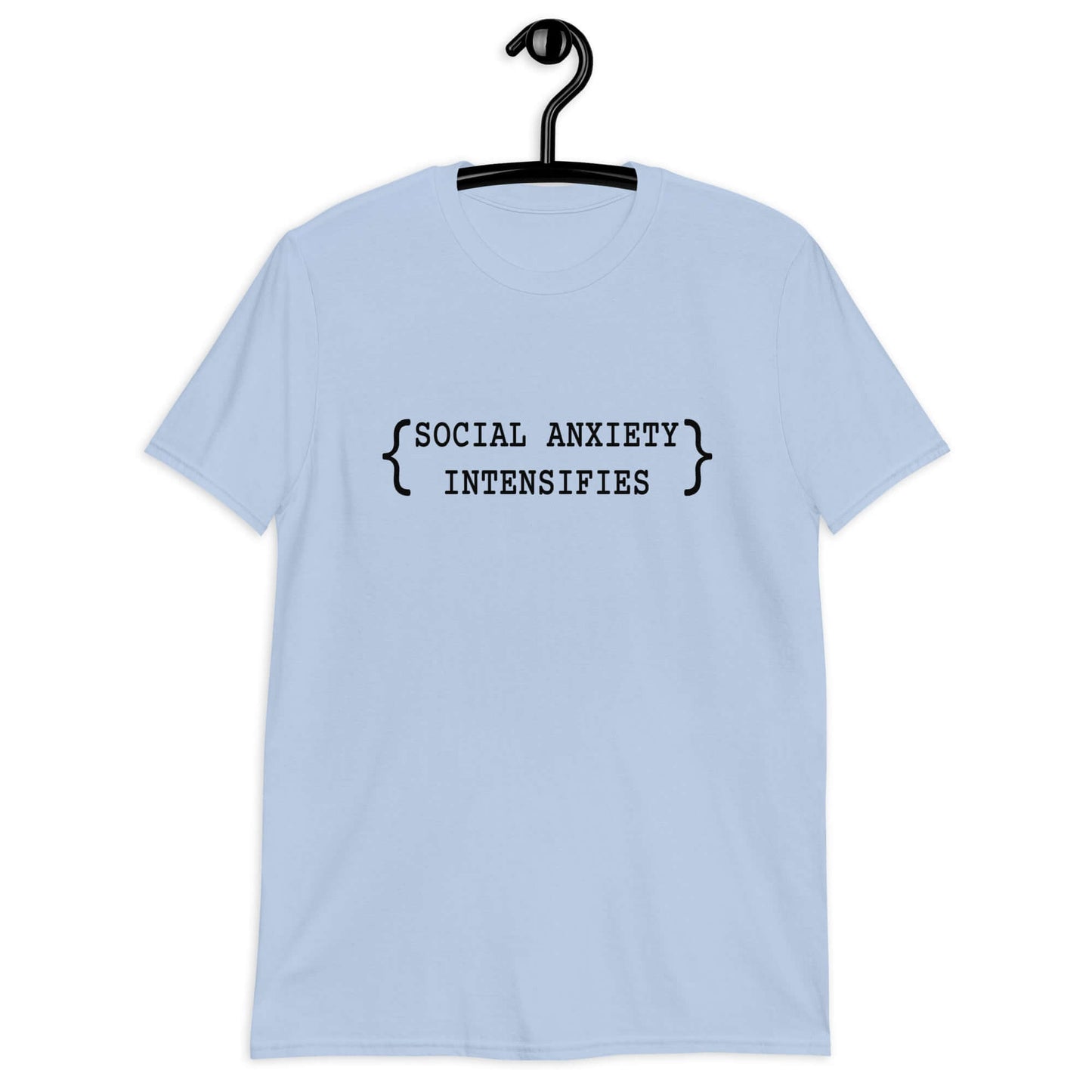 Light blue t-shirt with the words Social anxiety intensifies printed on the front.