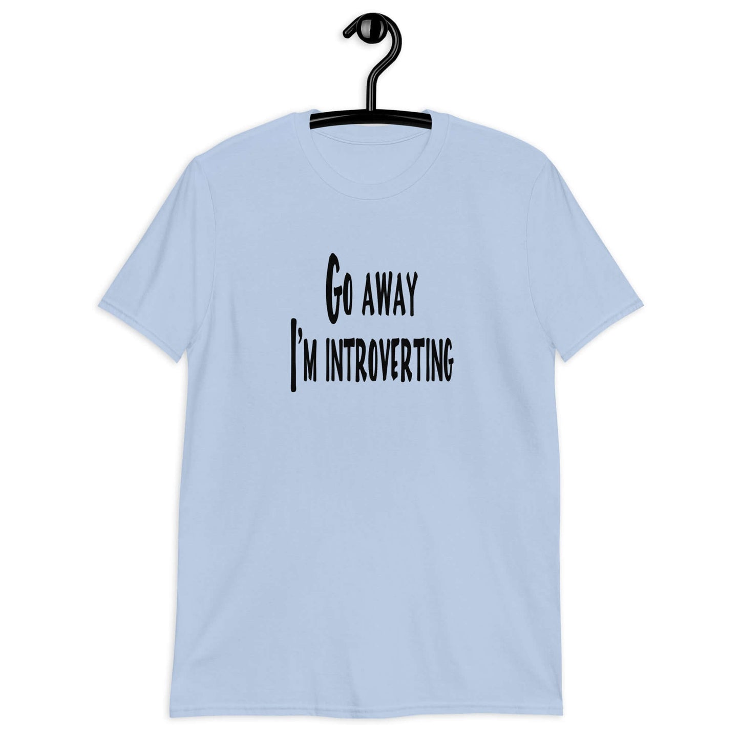 Light blue t-shirt with the phrase Go away, I'm introverting printed on the front of the shirt.