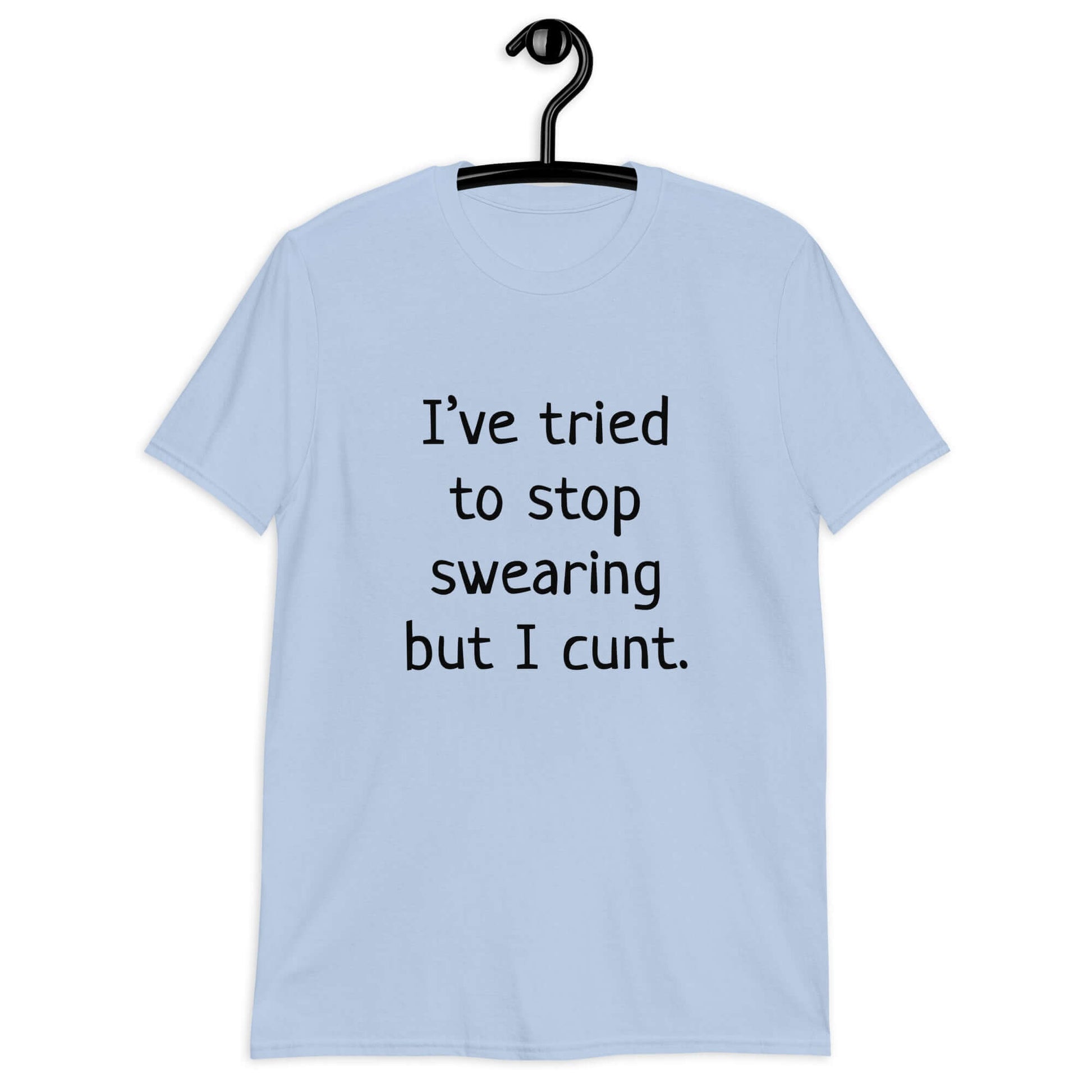 Light blue t-shirt with the phrase I've tried to stop swearing but I cunt printed on the front.