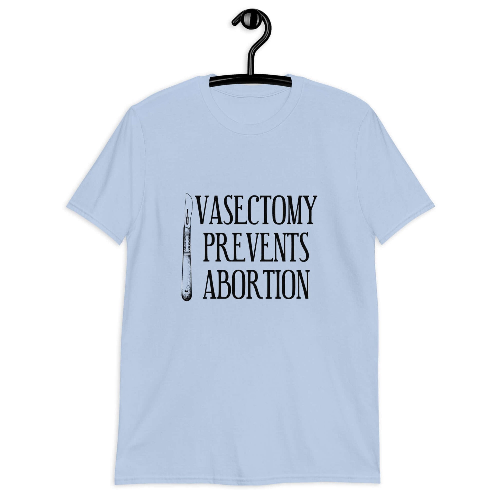 Light blue t-shirt that has an image of a surgical scalpel and the phrase Vasectomy prevents abortion printed on the front.