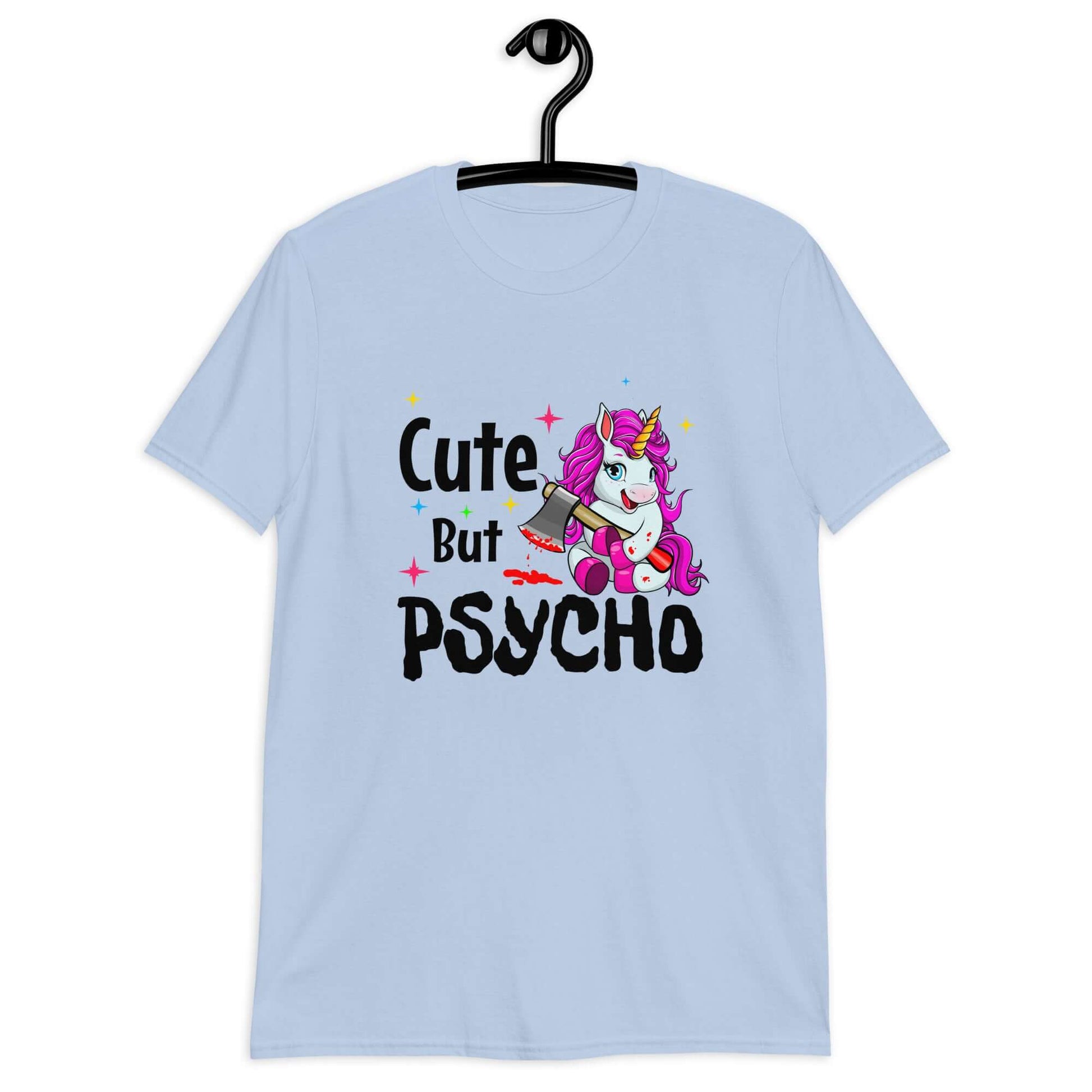 Light blue t-shirt that has a graphic of a unicorn holding a knife & the words Cute but psycho printed on the front.