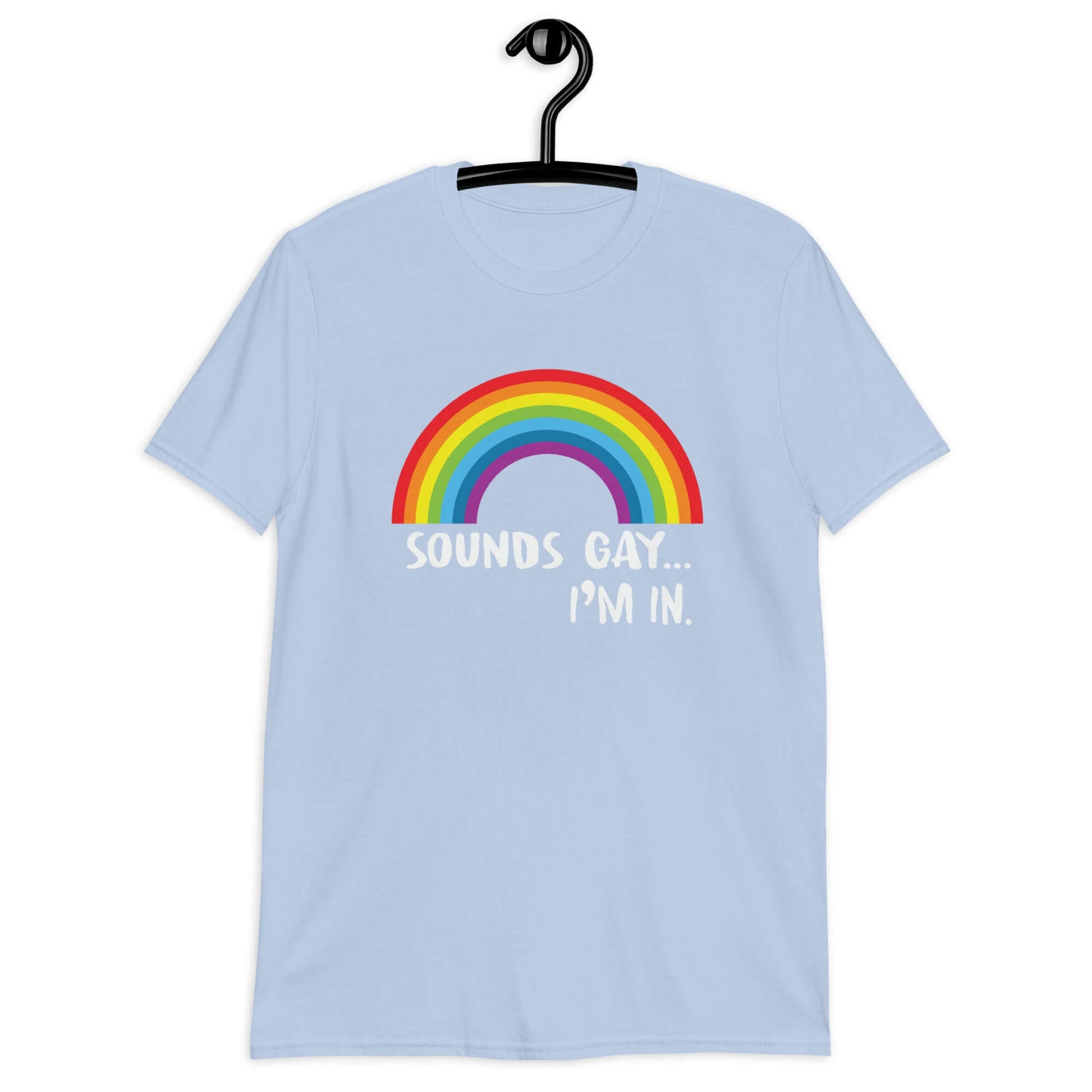 Light blue t-shirt that has an image of a rainbow and the phrase Sounds gay, I'm in printed on the front