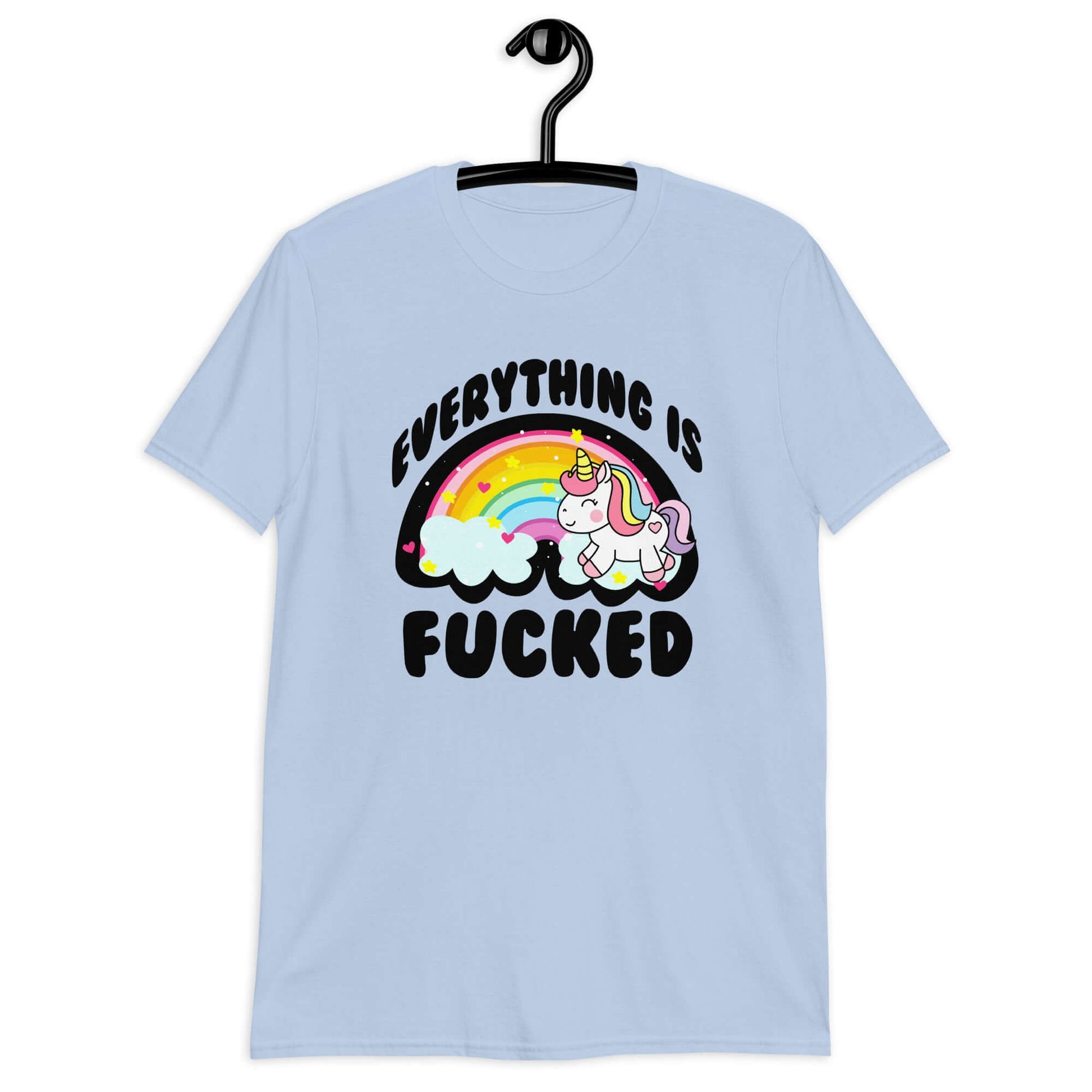 Light blue t-shirt with a graphic of a kawaii style unicorn and a pastel rainbow with the words Everything is fucked printed on the front.