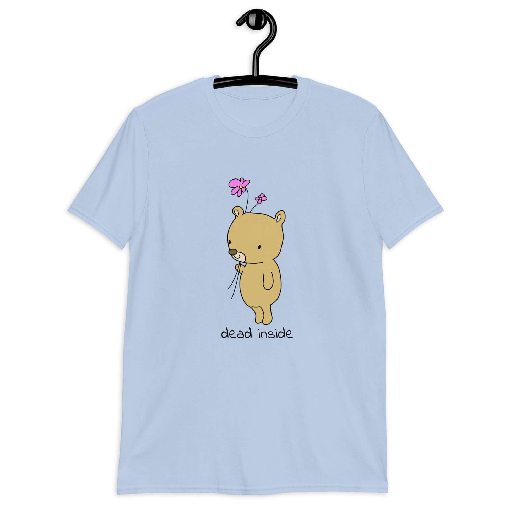 Light blue t-shirt with an image of a cute bear holding 2 pink flowers. The words Dead inside are printed underneath the bear. The graphics are printed on the front of the shirt.