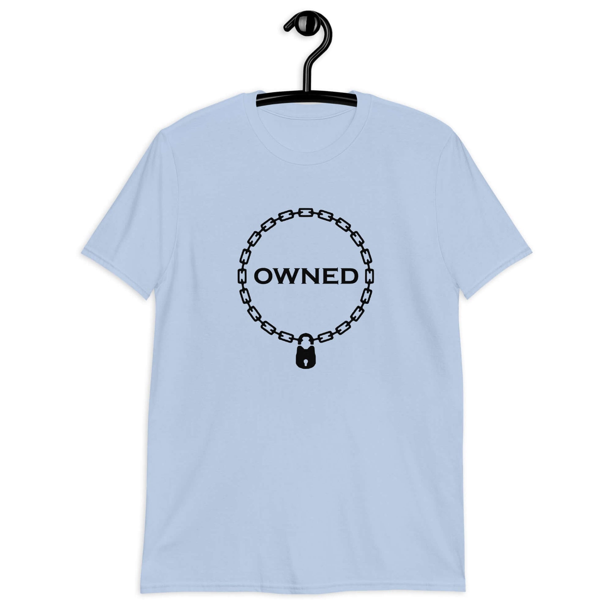 Light blue t-shirt with an image of a BDSM chain collar with a lock and the word Owned printed in the center of the collar. The design is printed on the front of the shirt.