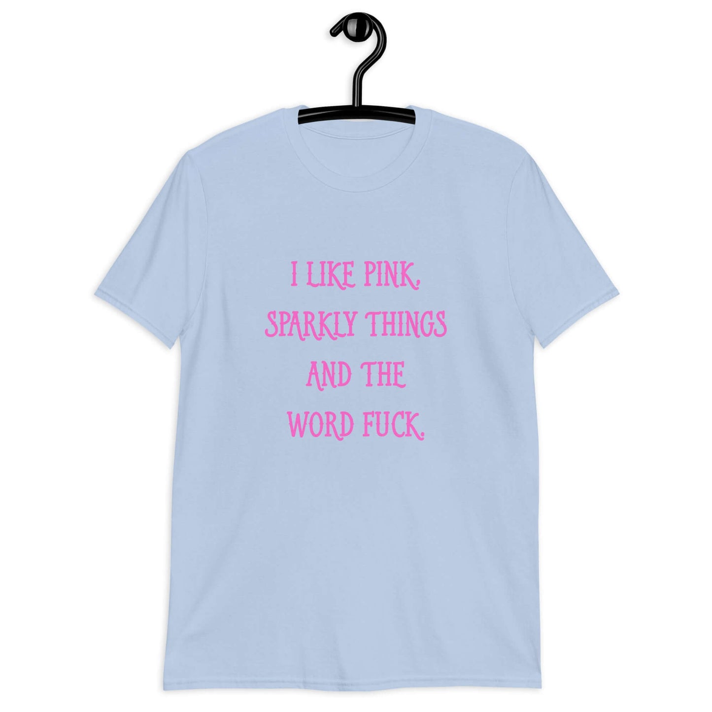 Light blue t-shirt with the phrase I like pink, sparkly things and the word fuck printed in pink on the front of the shirt.