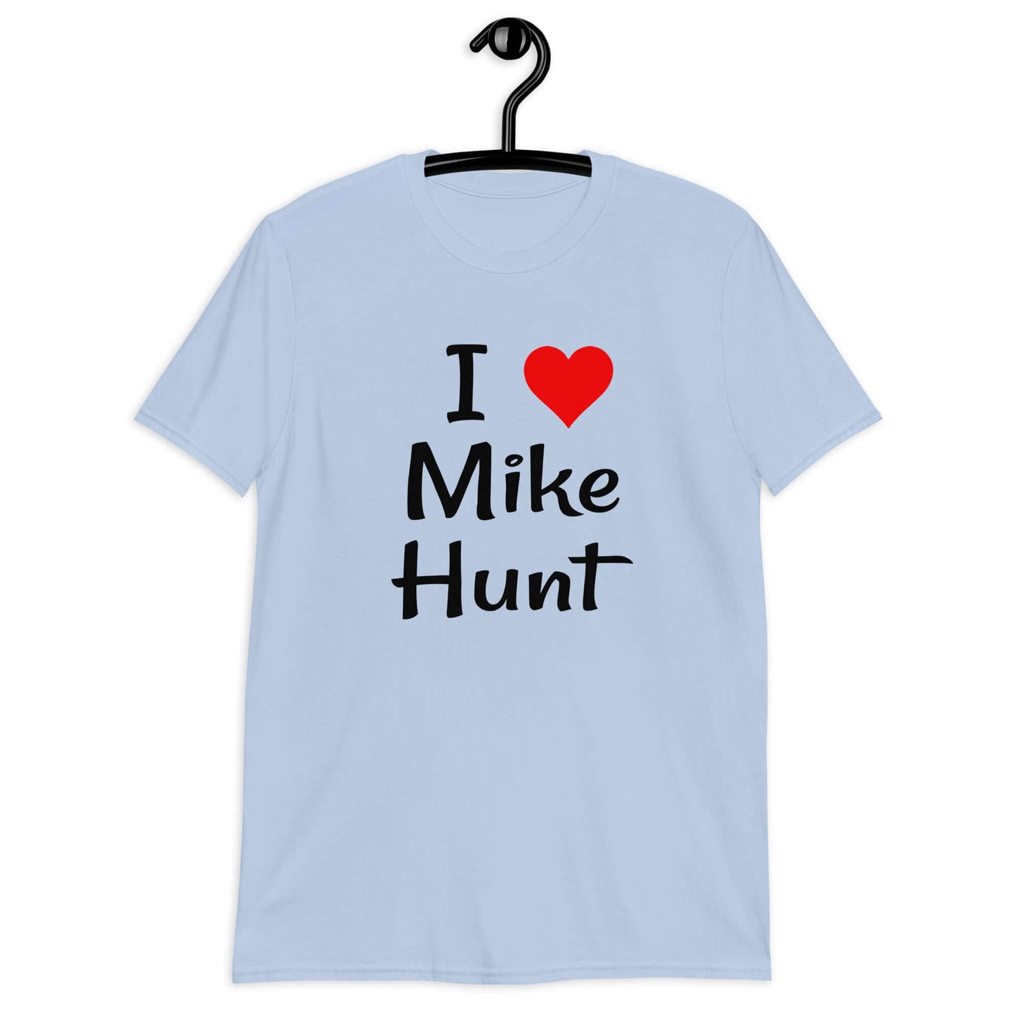 Light blue t-shirt with pun I heart Mike Hunt printed on the front. The heart is red.