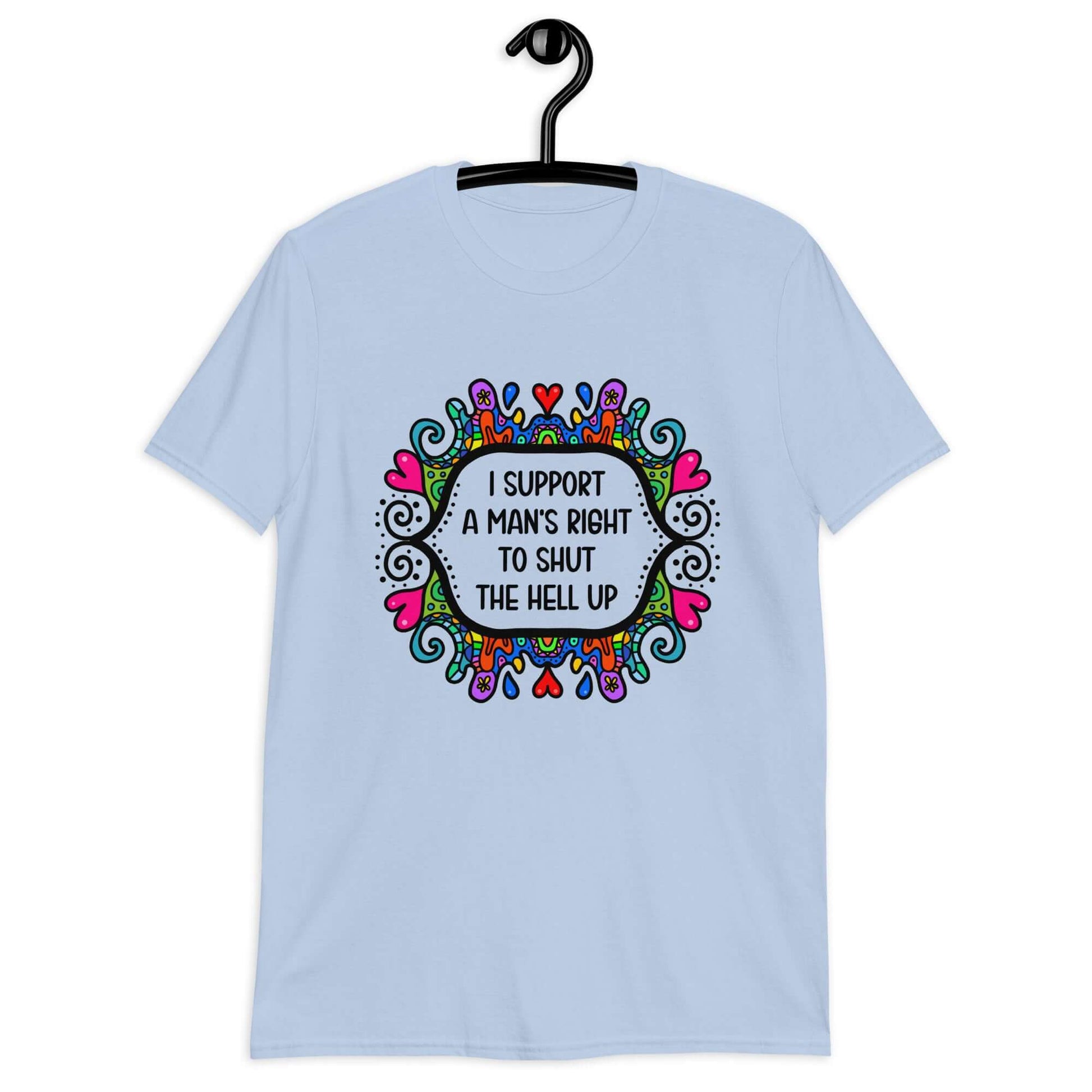 Light blue t-shirt with a colorful doodle graphic and the words I support a man's right to shut the hell up printed on the front.