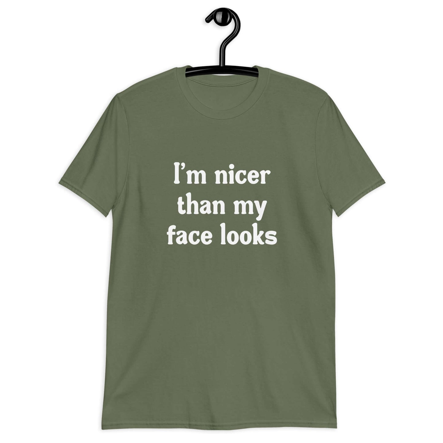 Military green t-shirt with the phrase I'm nicer than my face looks printed on the front.