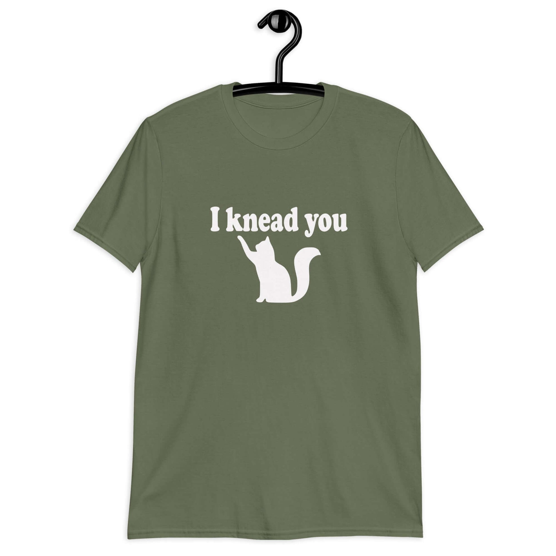 Military green t-shirt that has an image of a silhouette of a cat and the words I knead you printed on the front.