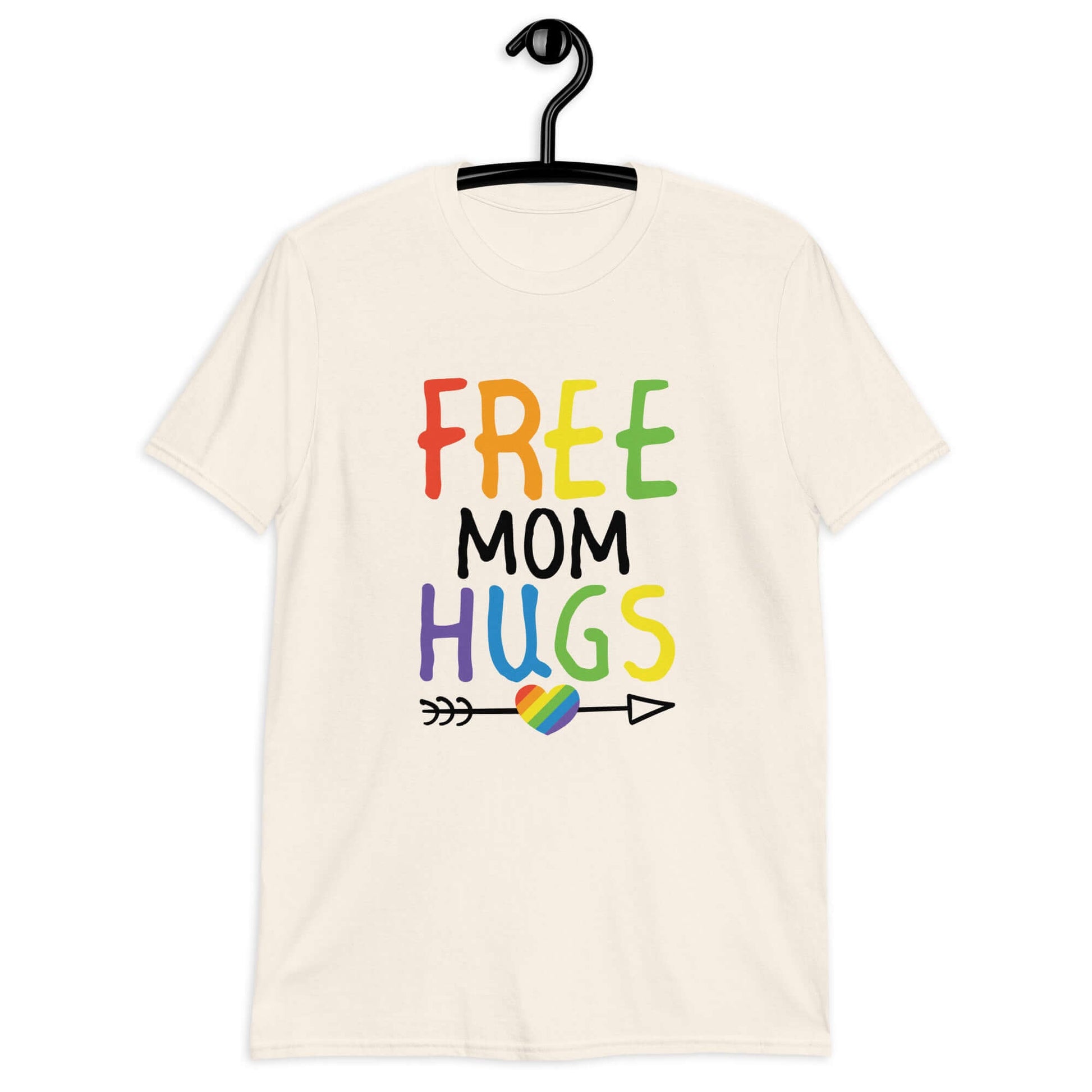 Natural off white color t-shirt with the phrase Free Mom hugs in rainbow lettering printed on the front.