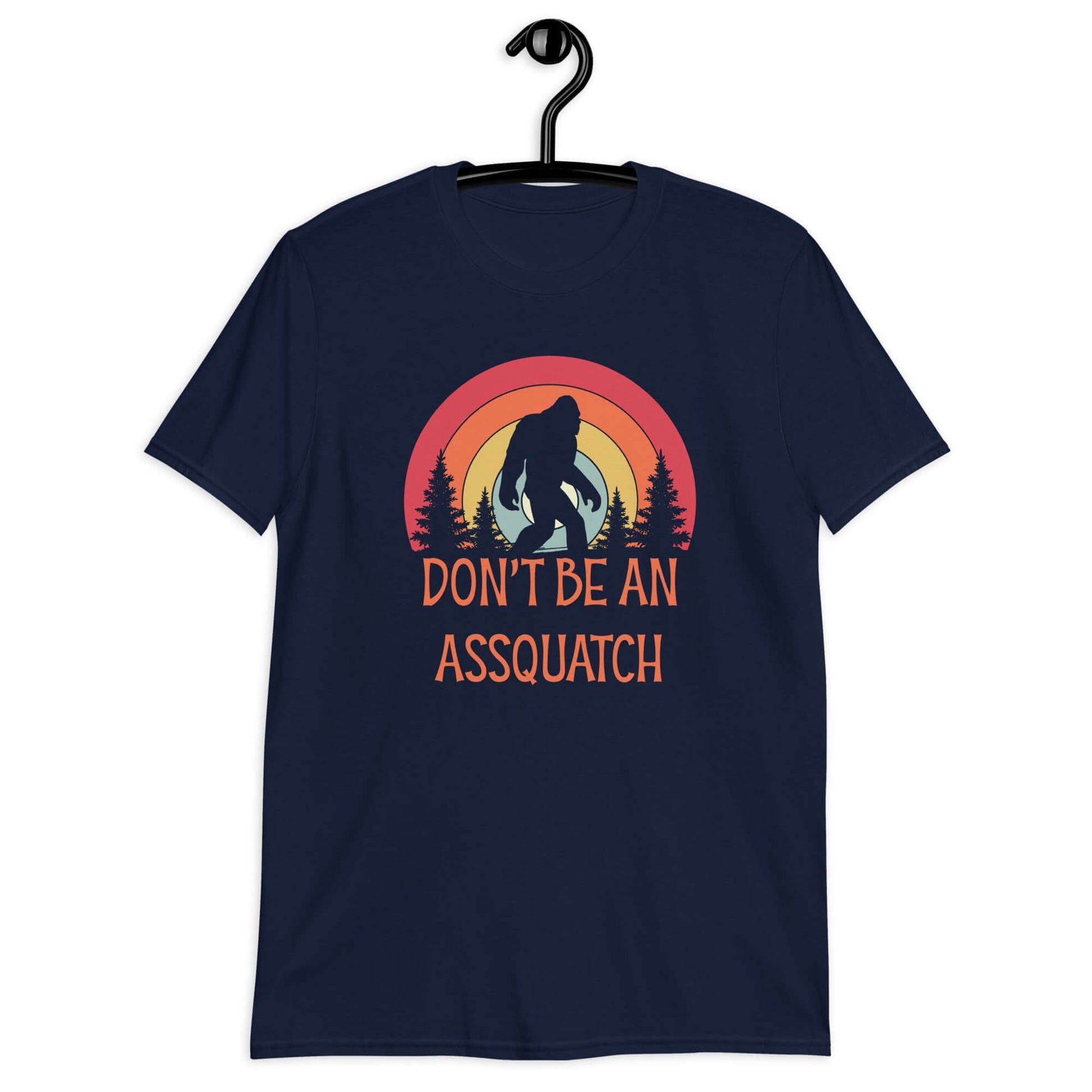 Navy blue t-shirt with sasquatch graphic with sasquatch graphic and the words don't be an assquatch printed on the front.