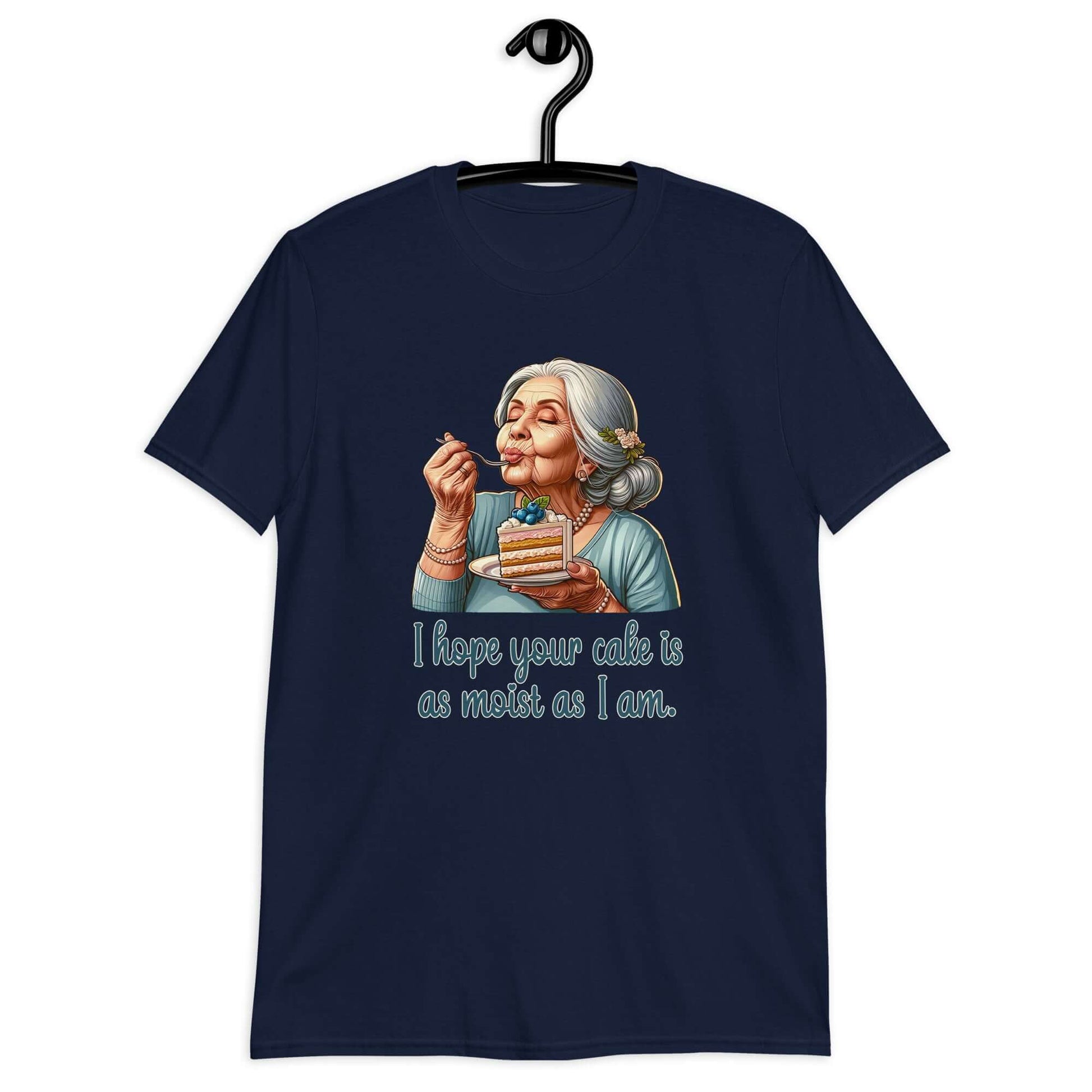 Navy blue t-shirt with image of grey haired older woman enjoying a bite of a piece of cake with the words I hope your cake is as moist as I am printed on the front.