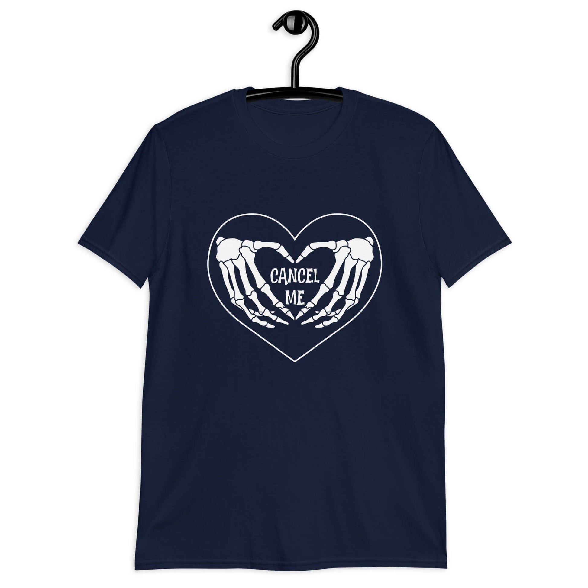 Navy blue t-shirt with a black heart and skeleton hands making a heart shape printed on the front. The words Cancel Me are inside of the heart.