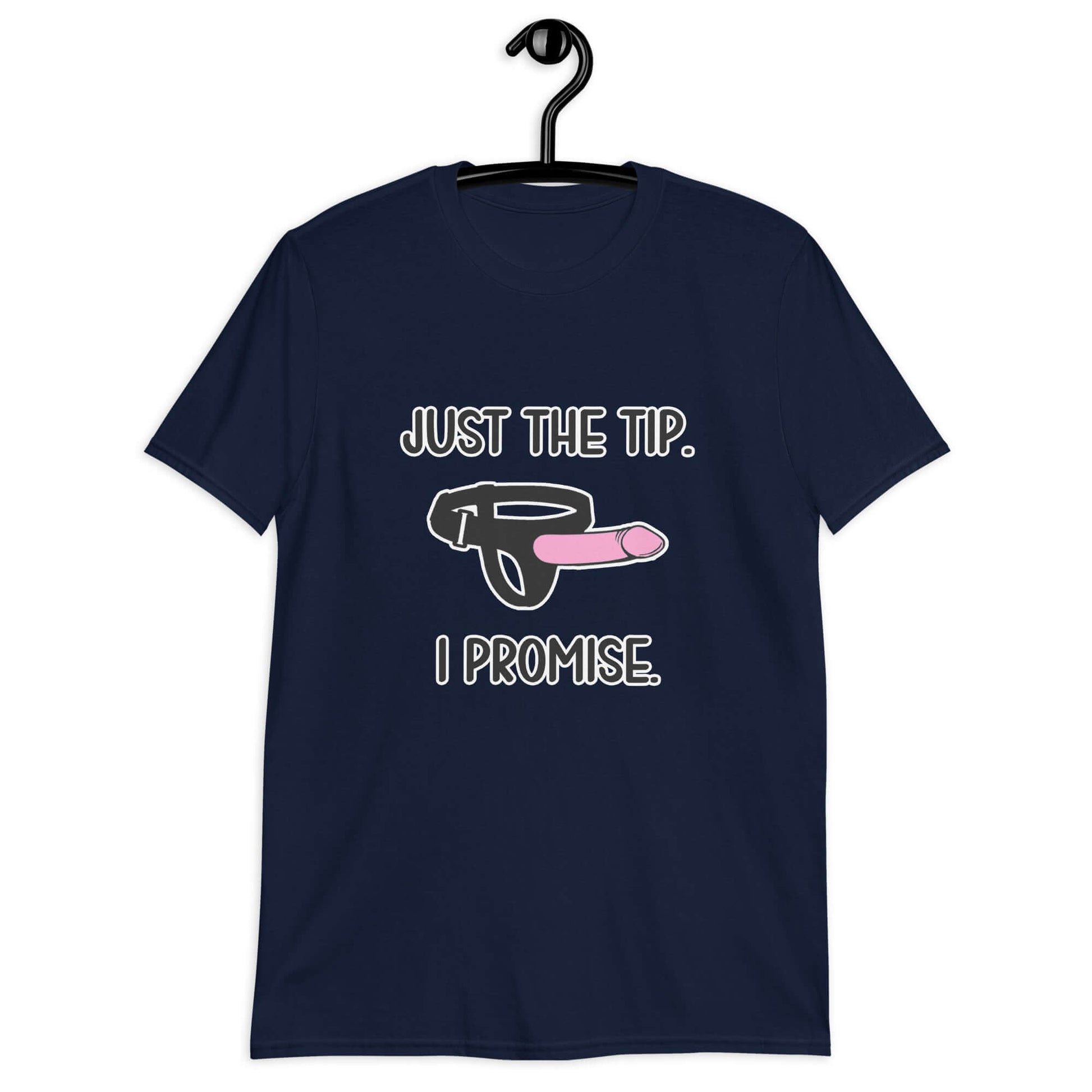 Navy blue t-shirt that has an image of a strap-on dildo and the words Just the tip, I promise printed on the front. The graphics are pink, black and white.