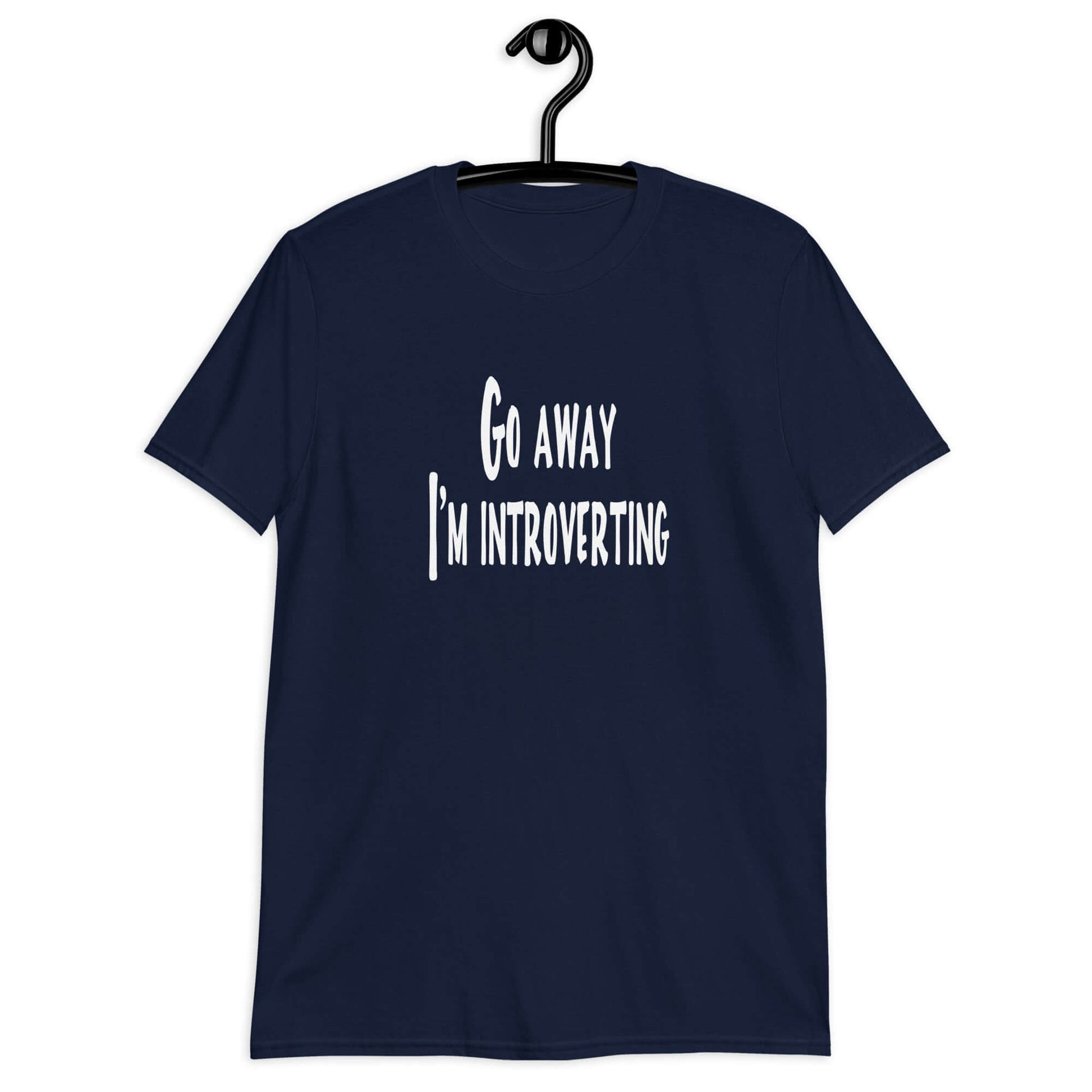Navy blue t-shirt with the phrase Go away, I'm introverting printed on the front of the shirt.