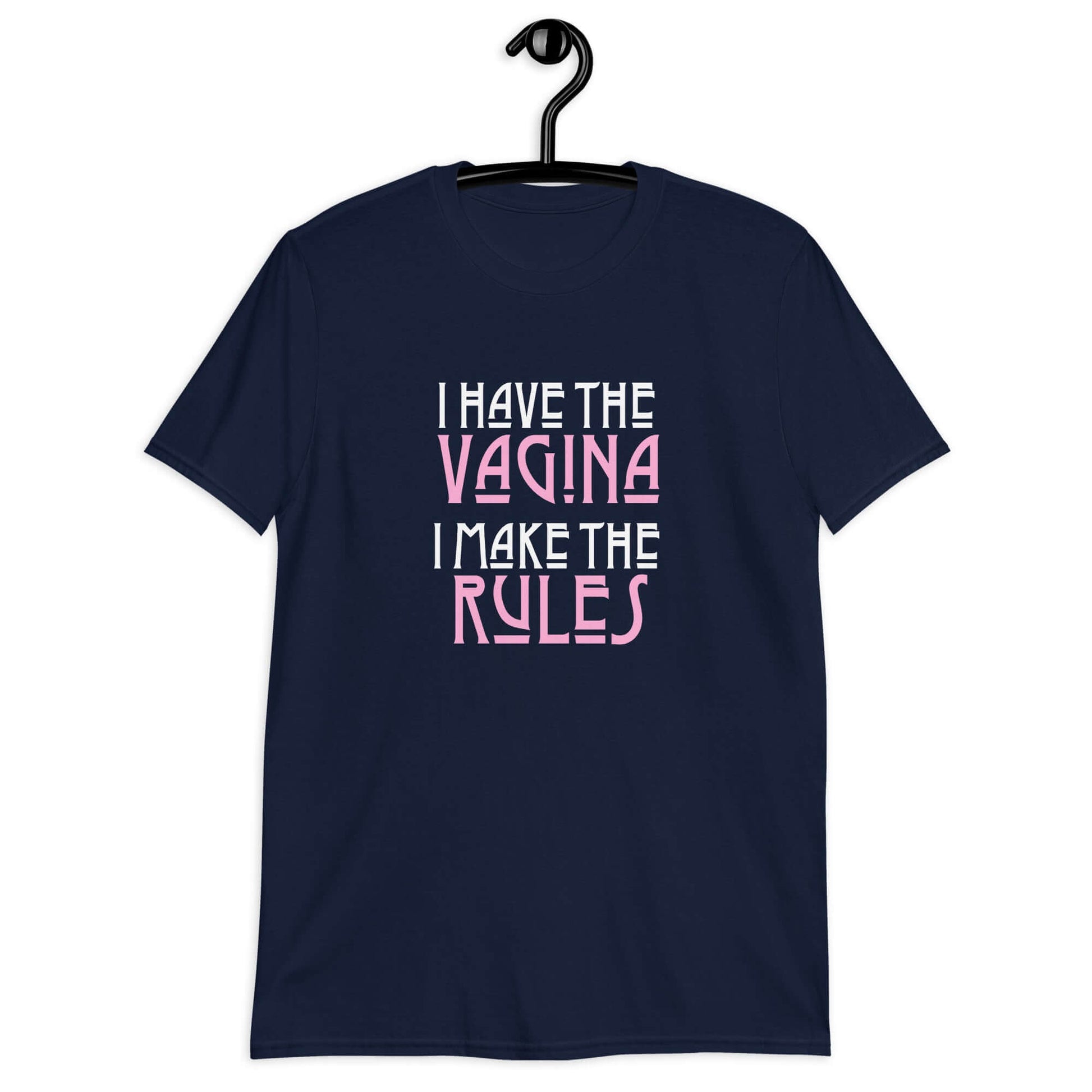 Navy blue t-shirt with the words I have the vagina , I make the rules printed on the front. The words vagina and rules are pink, the rest of the words are white.