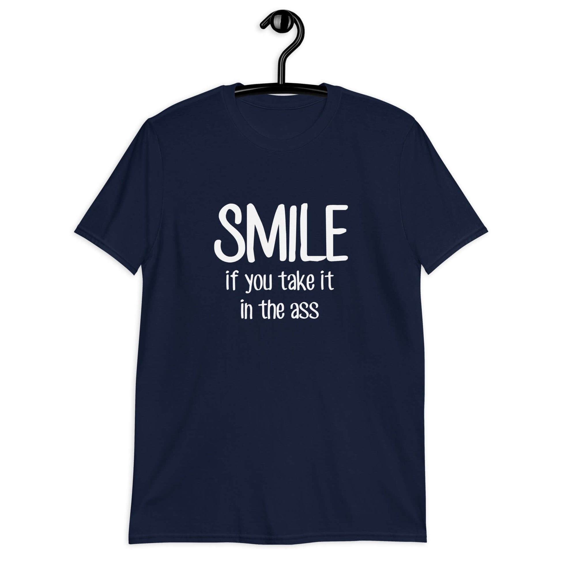 Navy blue t-shirt with the phrase Smile if you take it in the ass printed on the front. The word smile is large and the words take it in the ass are much smaller.