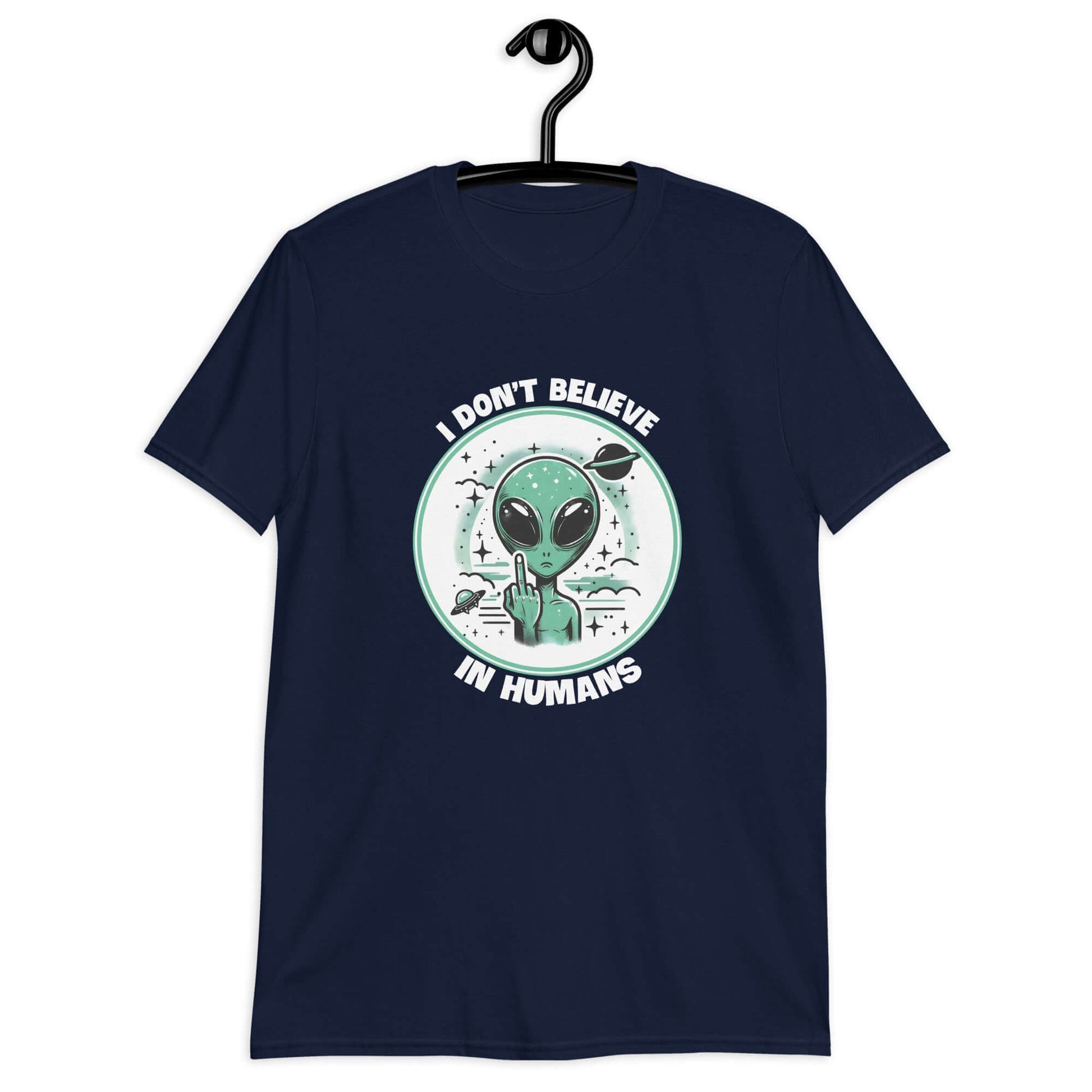 Navy blue t-shirt with an image of an alien flipping the middle finger. The words I don't believe in humans are printed around the image. The graphics are printed on the front of the shirt.